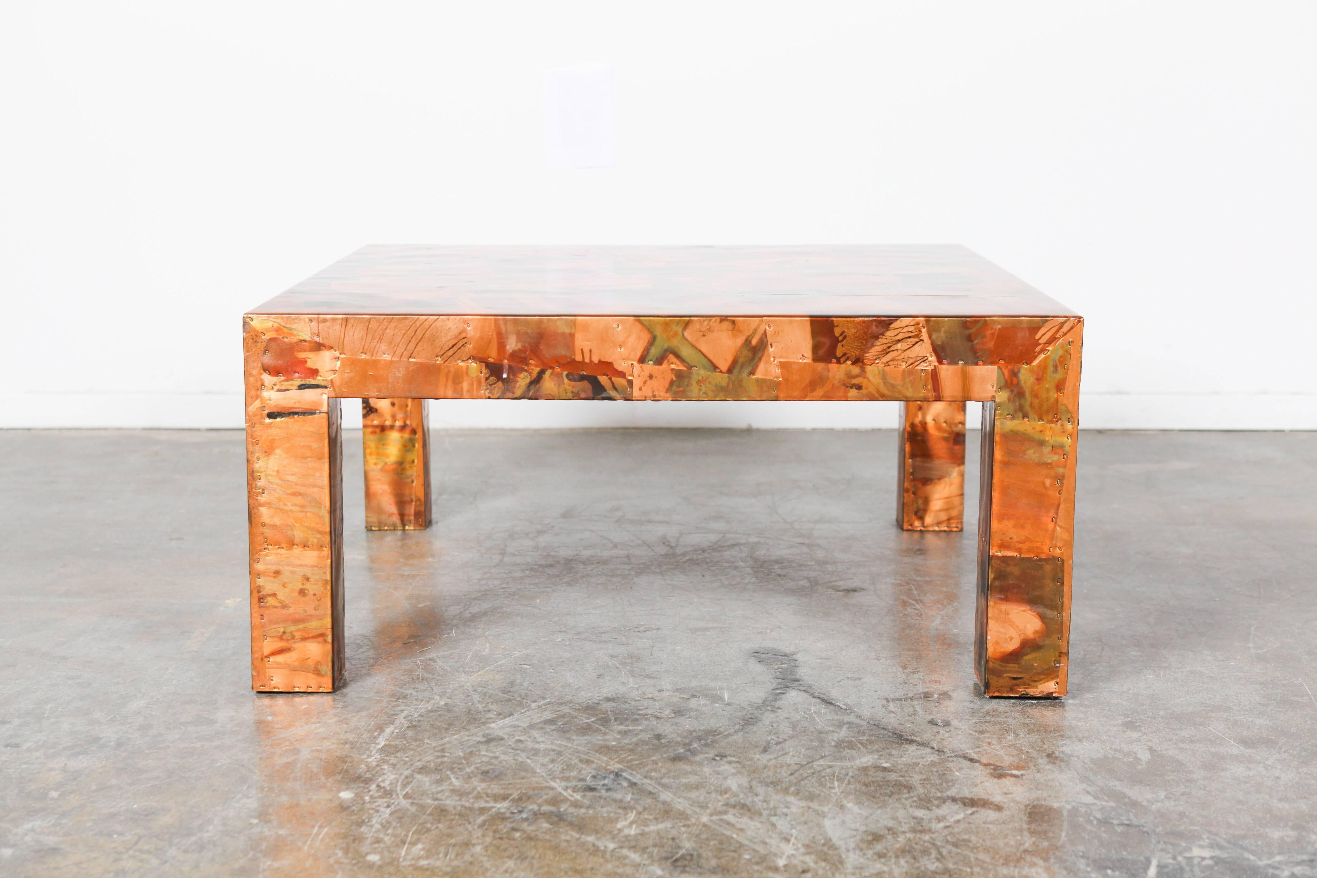 Brazilian Mid-Century Modern square hammered mixed metal coffee table with block legs designed by Percival Lafer.