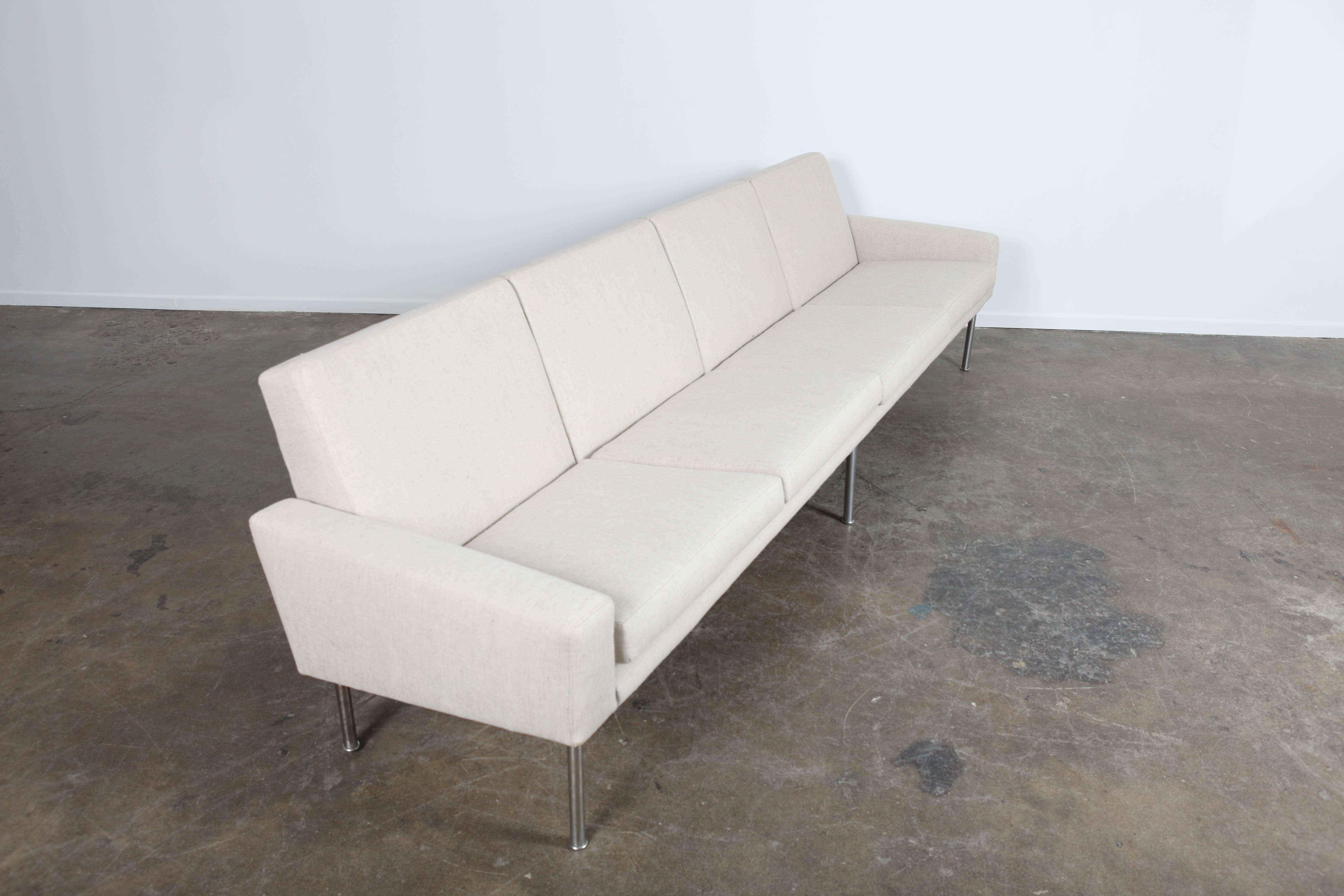 Four-seat 'Airport' sofa by Hans Wegner, Denmark, 1960s. Newly reupholstered.
