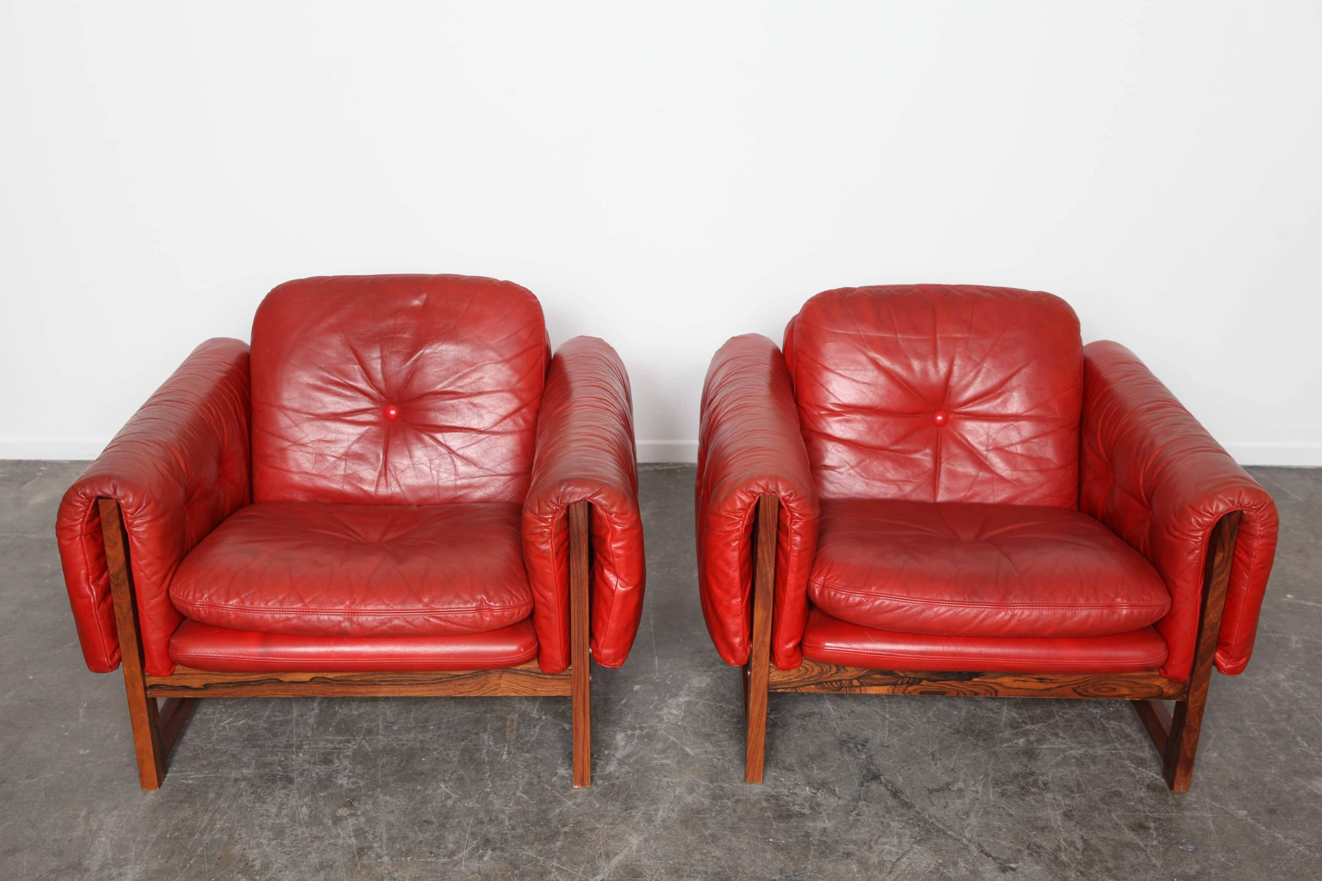 Pair of tufted, red leather 