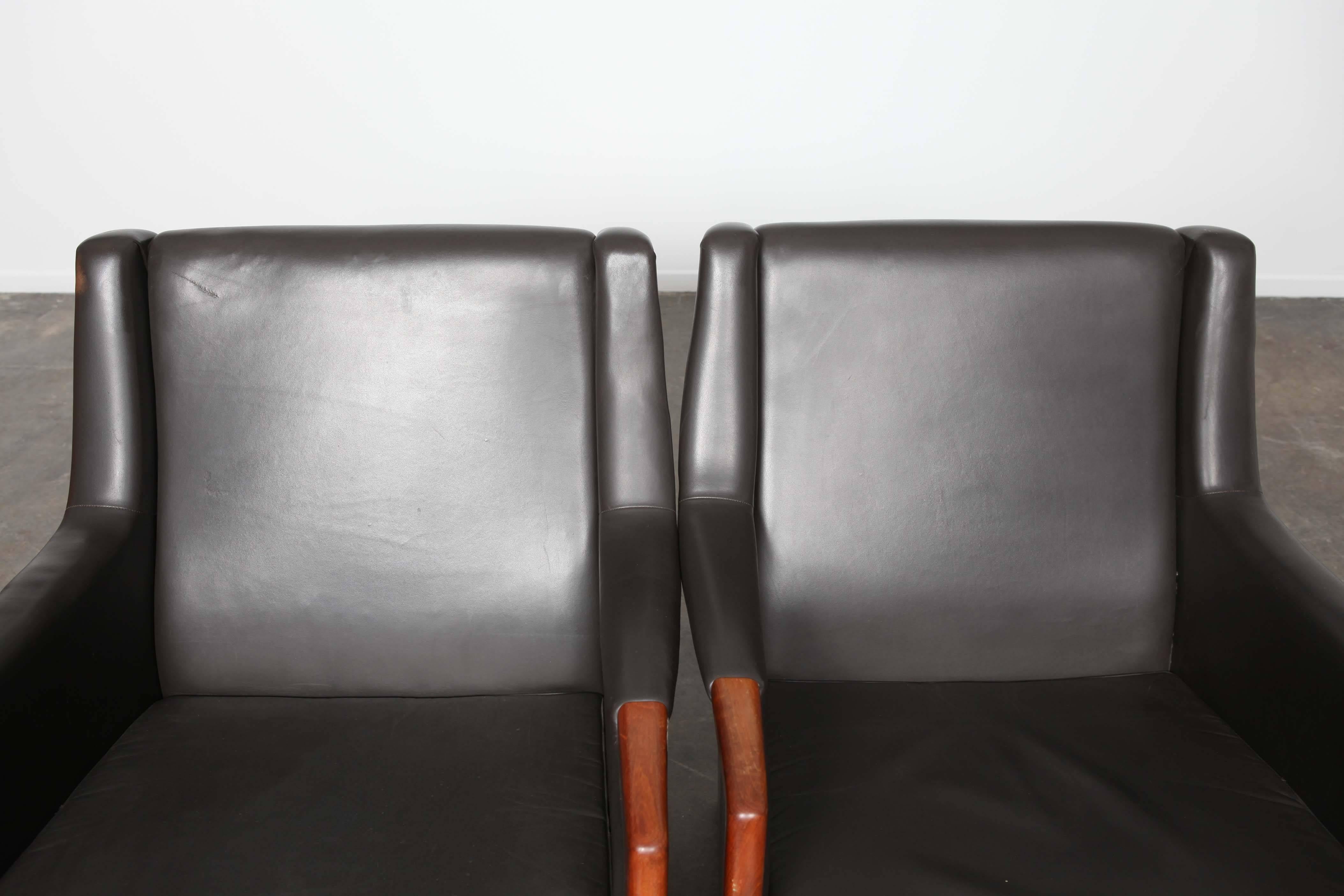 Mid-20th Century Pair of Black Leather Lounge Chairs by Karl Erik Ekselius of Sweden