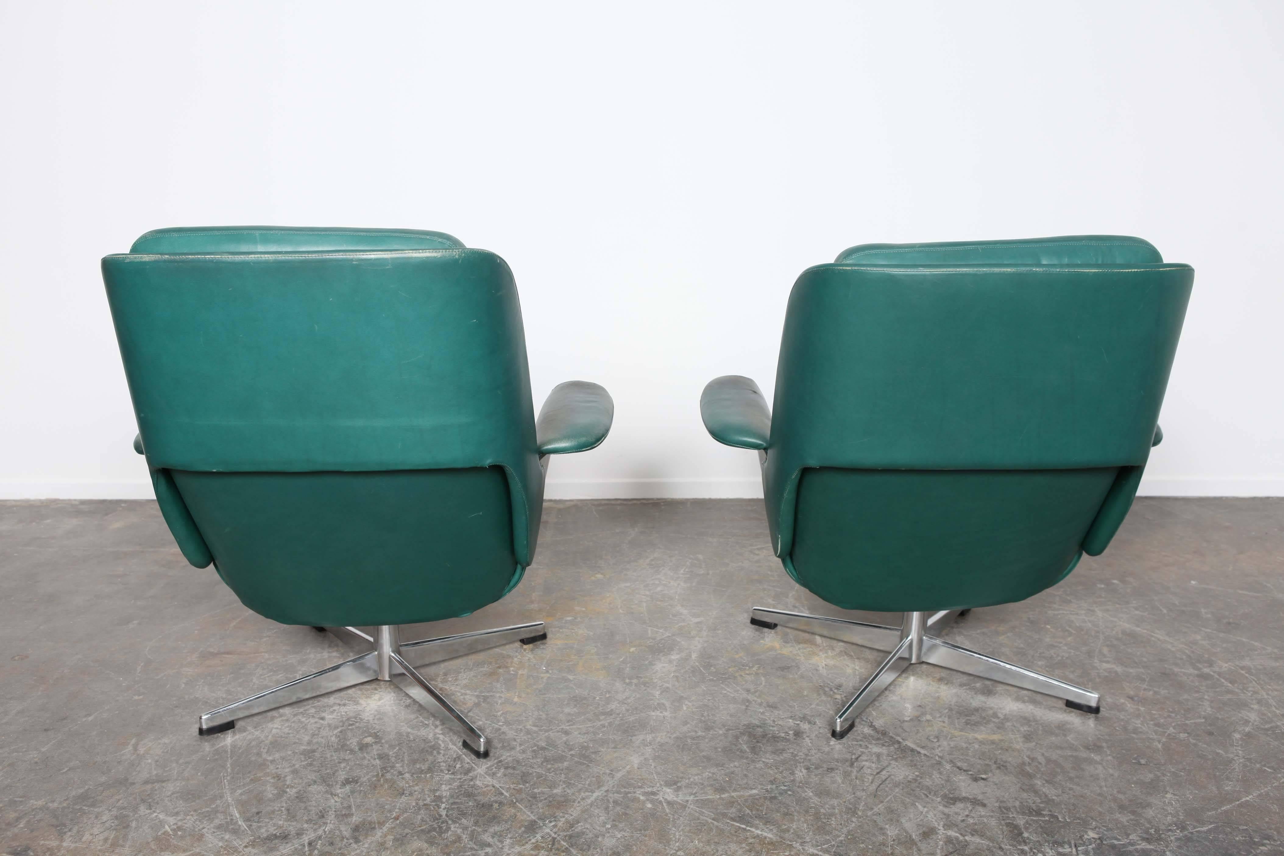 Mid-20th Century Danish Midcentury Green Leather Swivel Lounge Chairs