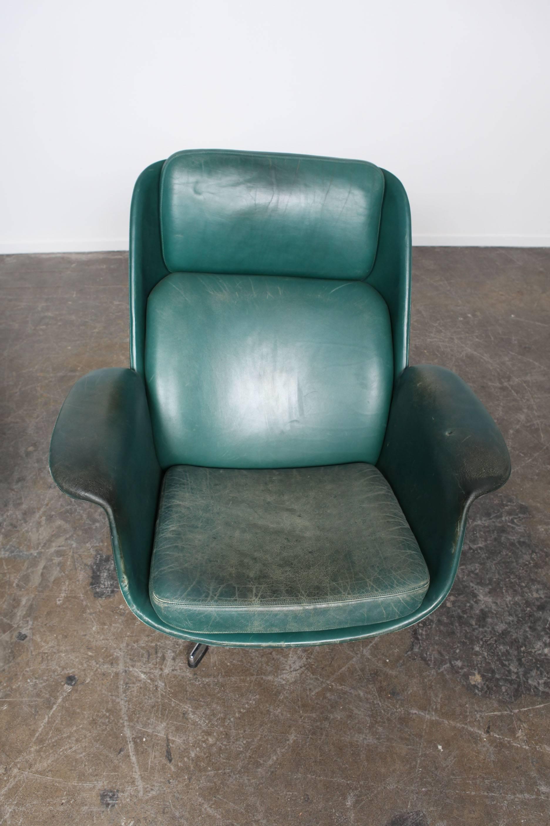 green leather swivel chair