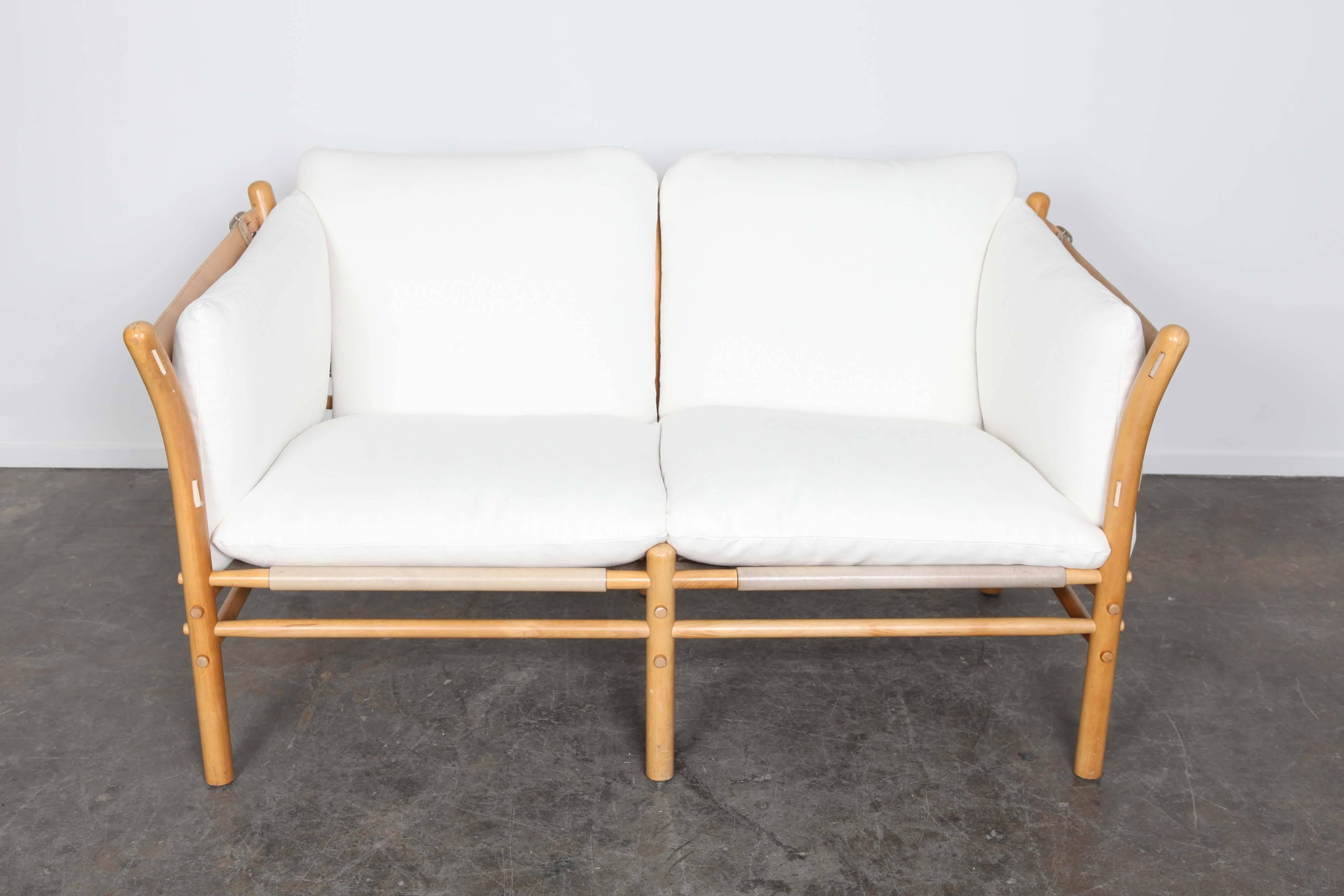 Two-seat 'Ilona' sofa by Arne Norell. Original leather and newly reupholstered.