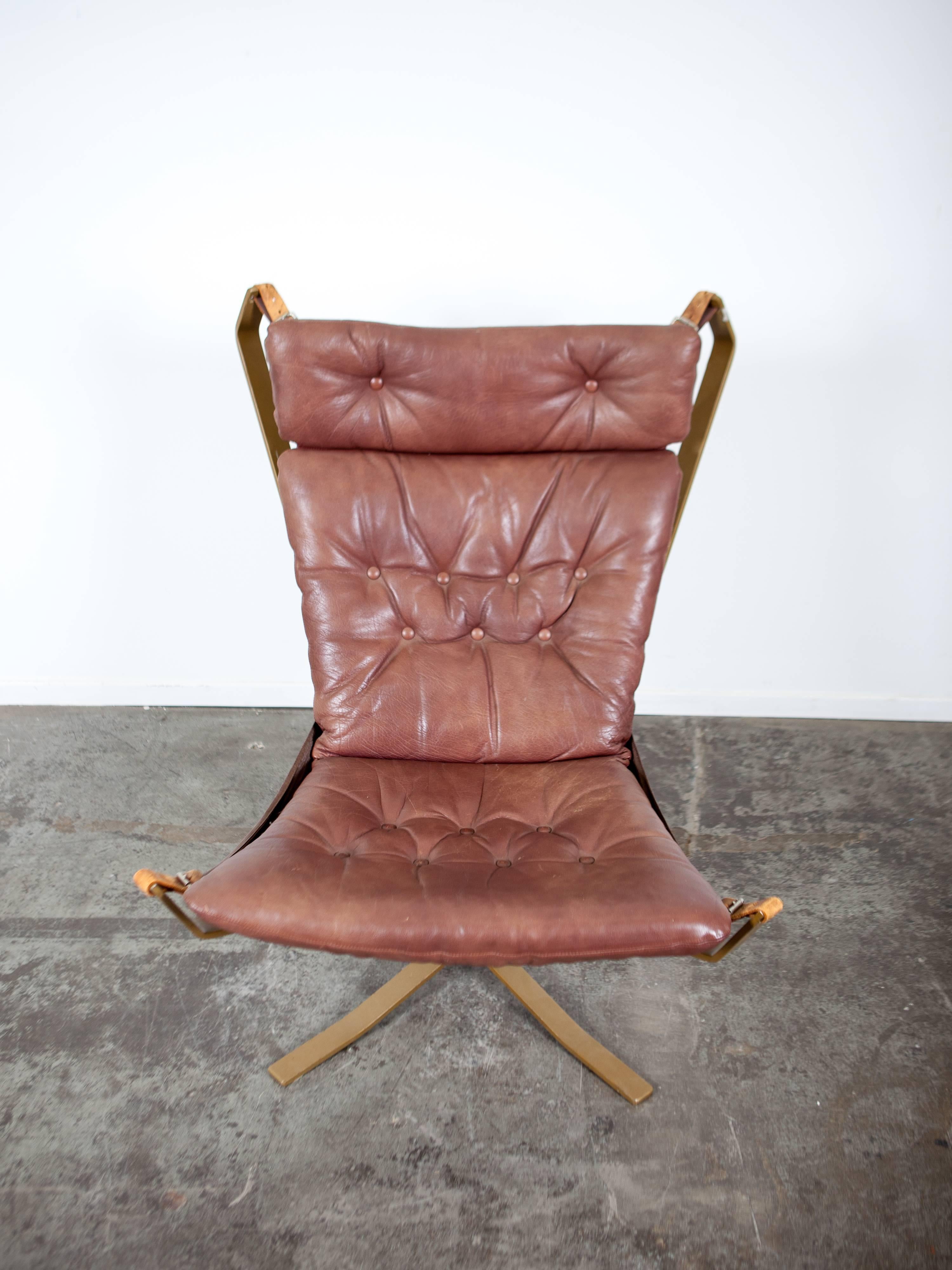 Metal Danish leather and metal framed Falcon-style chair, 1960's.
