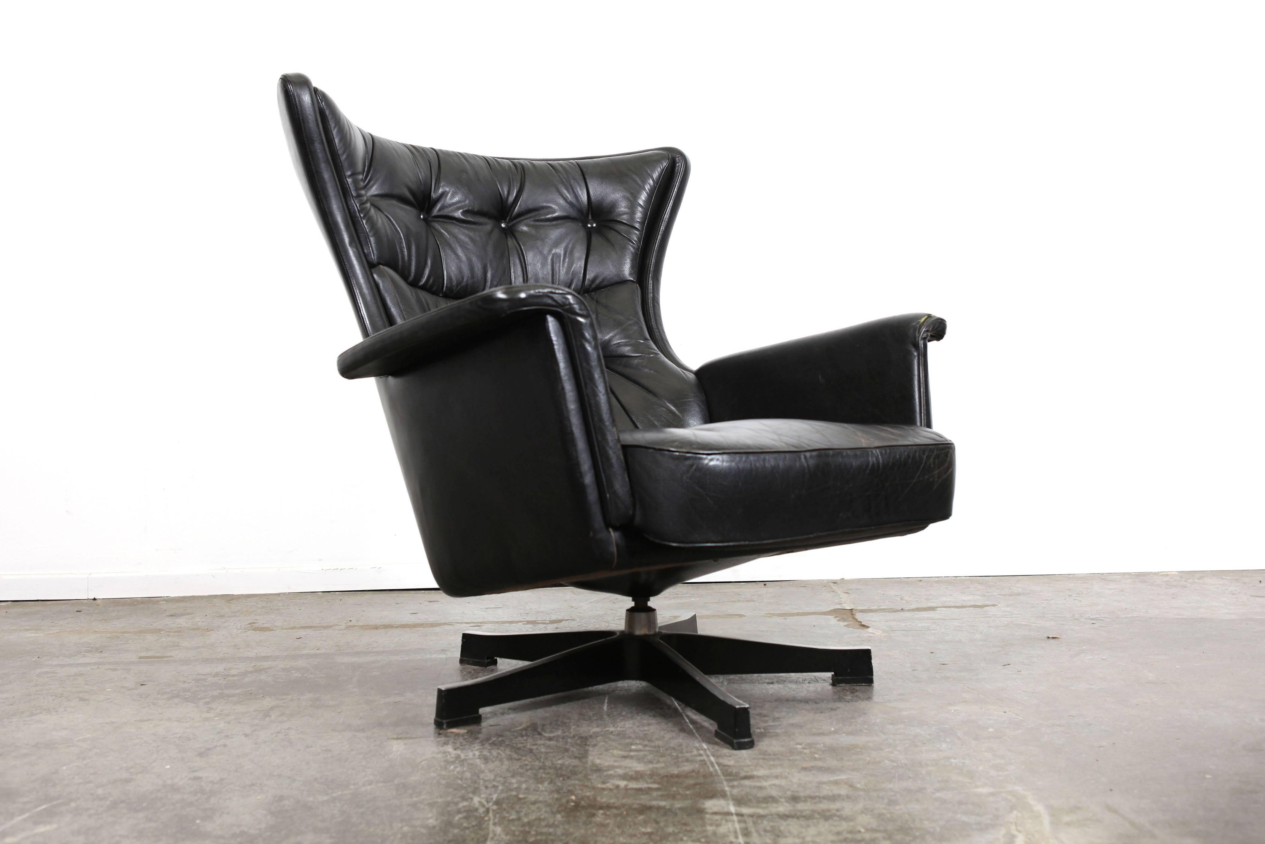 vintage black leather swivel chair