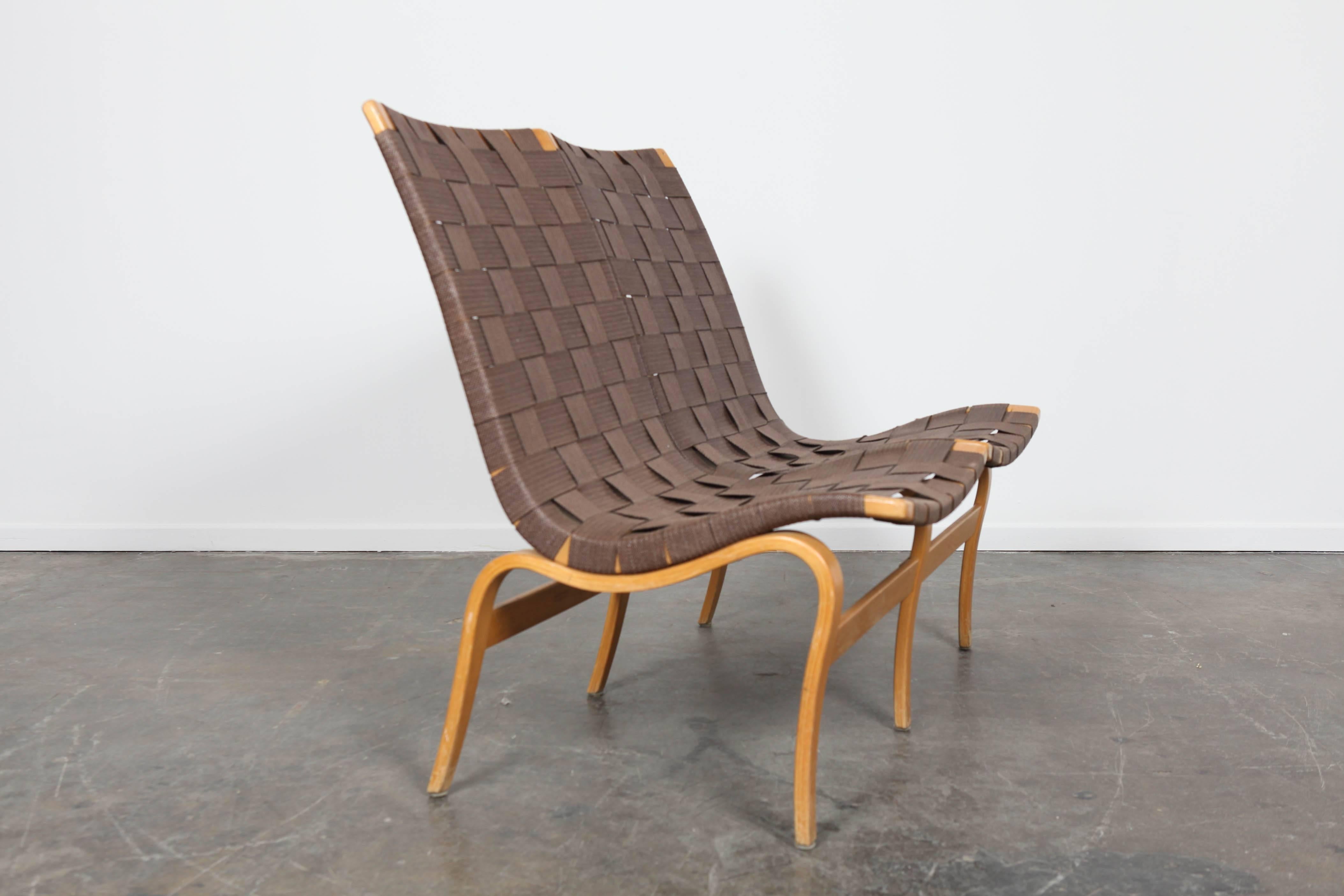 Swedish Mid-Century Modern two-seat settee webbed sofa by Bruno Mathsson.