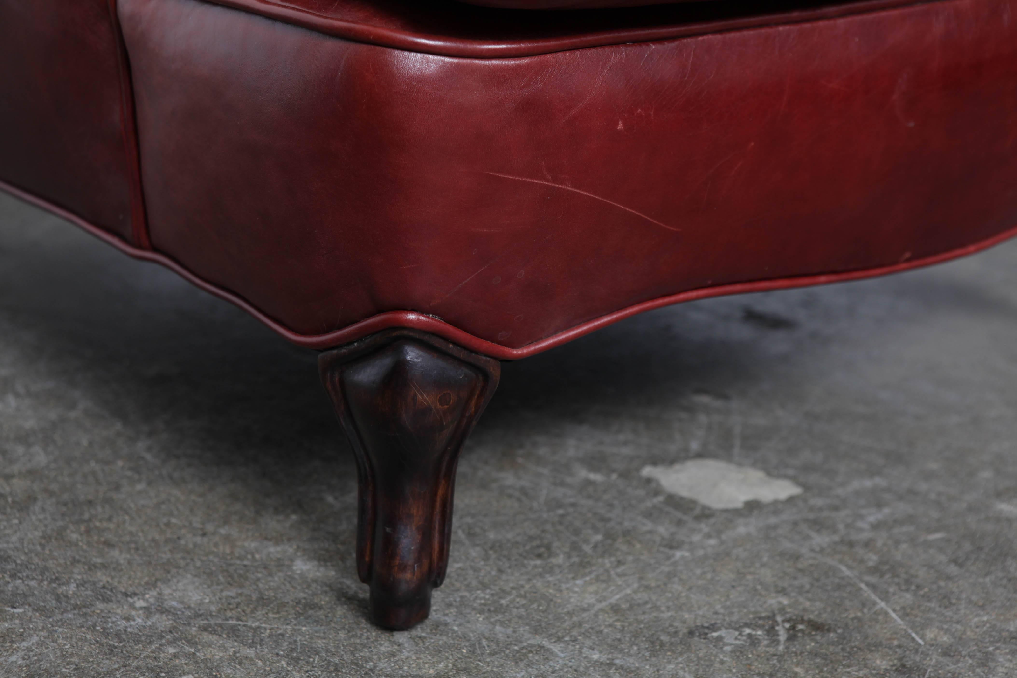 Mid-20th Century Oxblood Leather Wing Back Button Tufted Lounge Chair