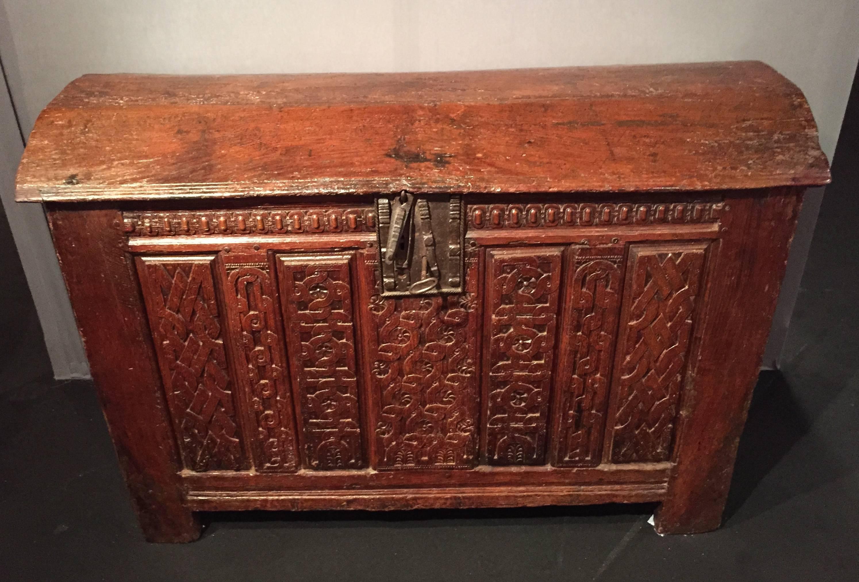 French Renaissance Oak Coffre Circa 1580
Rare safe renaissance arched top in solid oak.
The facade consists of four panels and three cross intricately carved complex geometric tracery, inlaid flowers and punched stars.
Listed on both