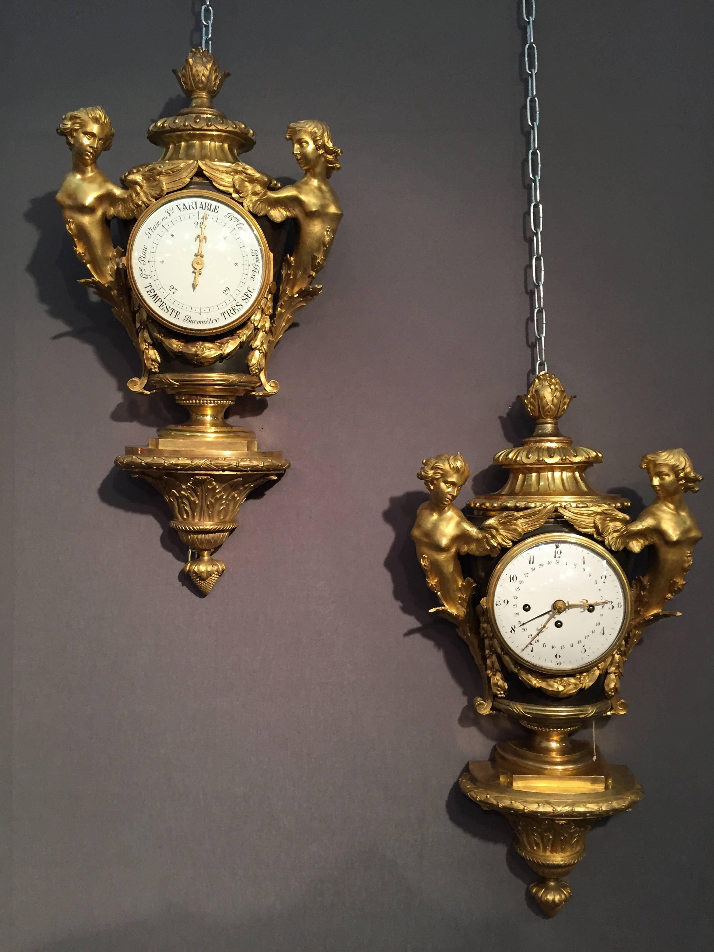 Rare pair of Cartel and barometer, Paris, circa 1775.
Rare alcove Cartel barometer sheet and ormolu, Paris, 1775.
Model vase-shaped balusters, body sheet metal adorned with a natural enamel dial, the latter stressed laurel garlands and flanked by