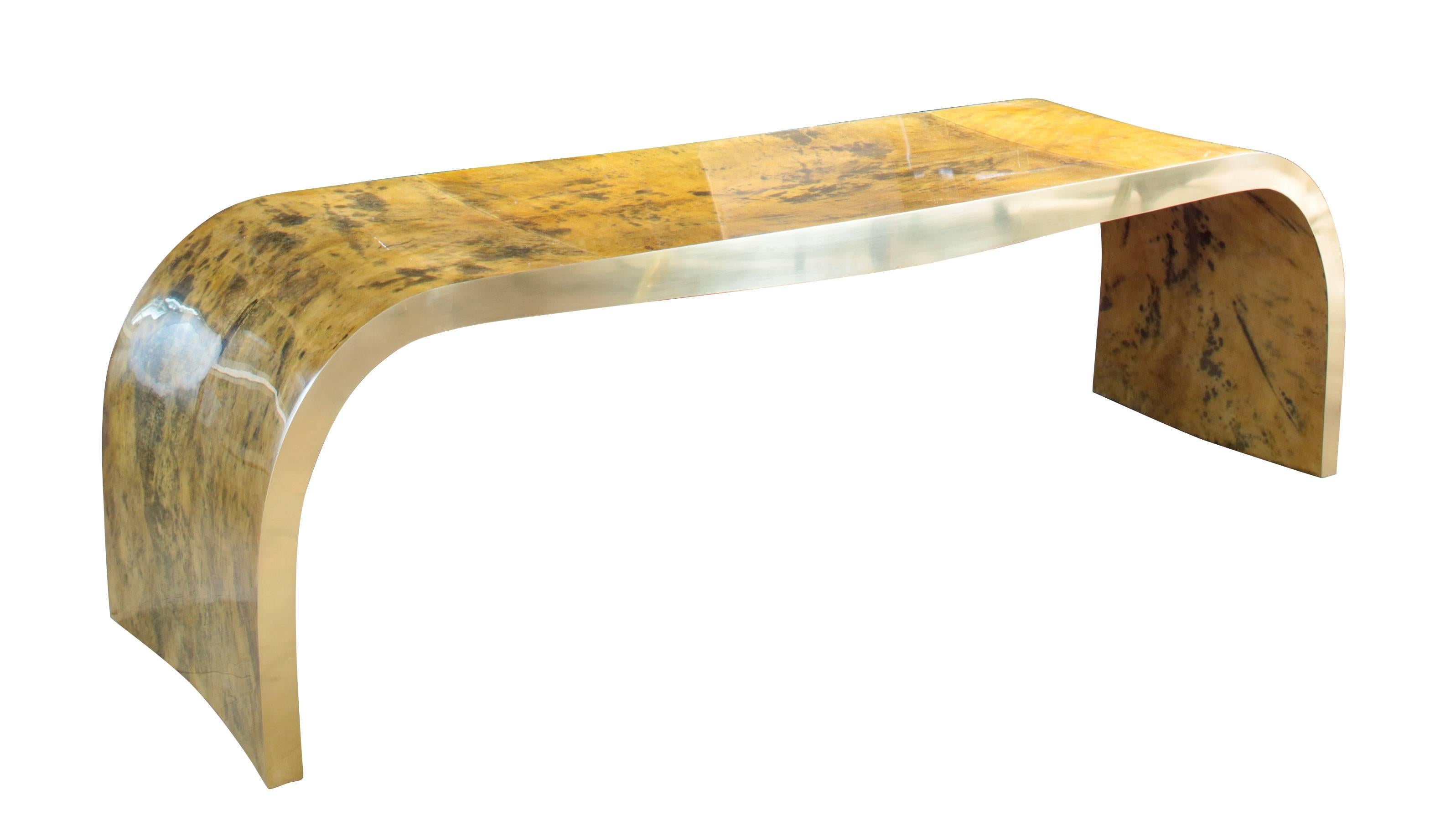 Stunning contemporary concave bench in vintage color goatskin with polished top coat in the style of Karl Springer.
