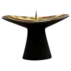 Pair of Candle Holders with Casted Brass Base and Polished Top by Carl Auböck