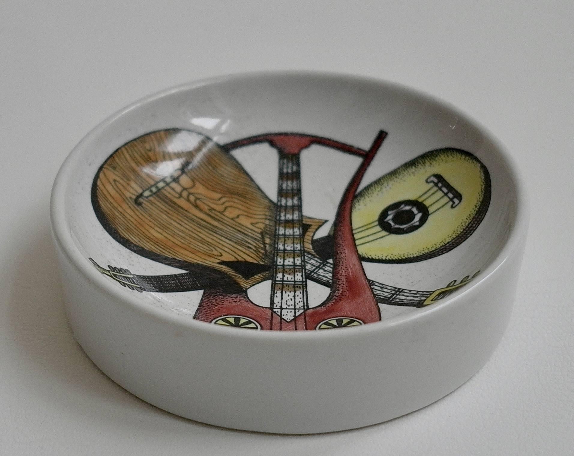 A ceramic dish by Piero Fornasetti 'Strumenti Musicali' in excellent condition.