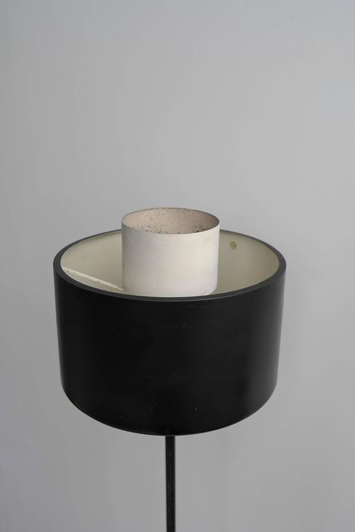 Rare Stilnovo floor lamp by Gaetano Sciolari, Italy, 1954. Typical minimalistic modernist Stilnovo lamp with a black and white lacquered aluminium shade, simple in vorm less is more. Stilnovo sticker visible inside the shade.