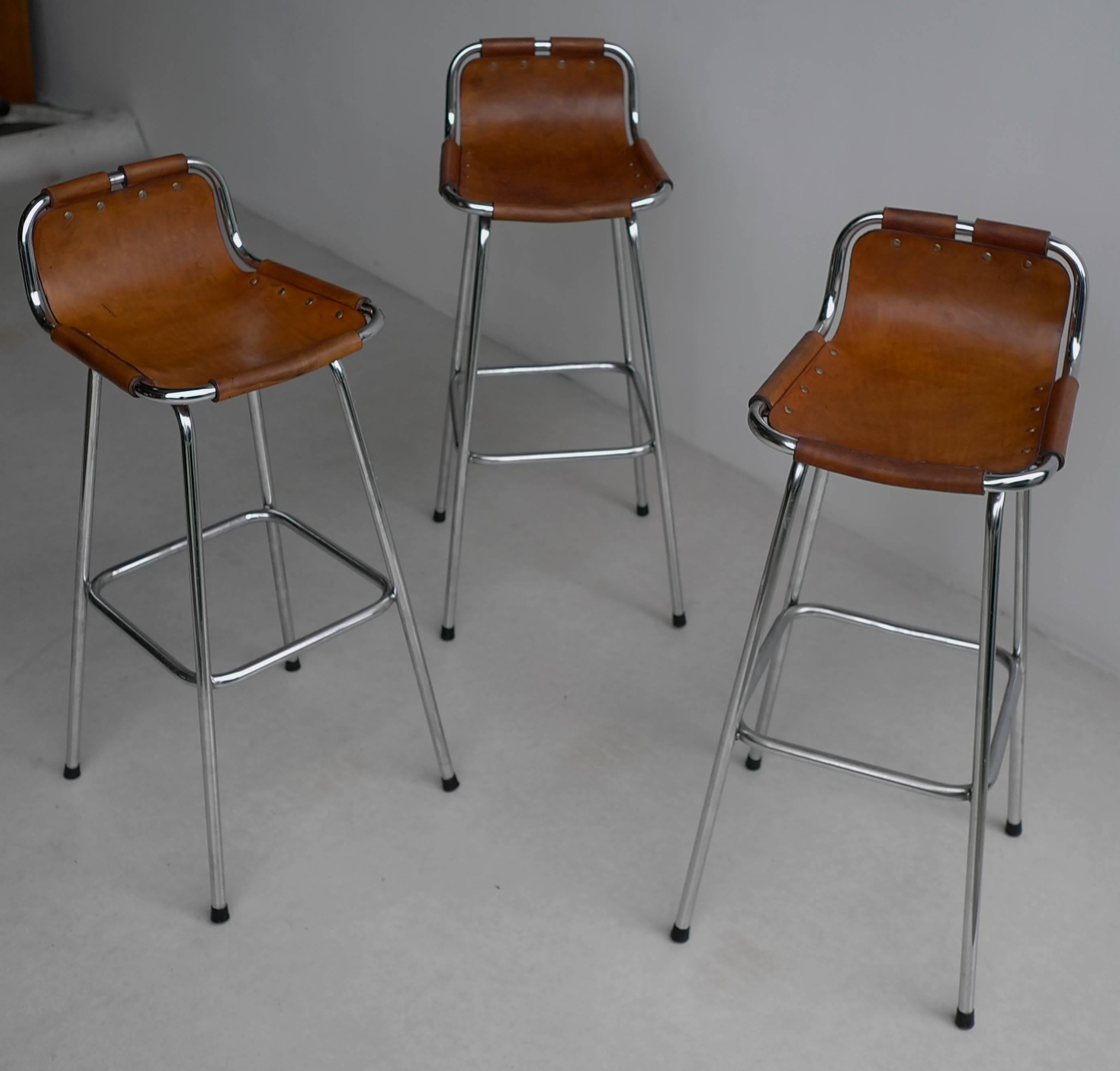 Charlotte Perriand leather barstools for Les Arc Ski Resort, France, 1960s.

Charlotte Perriand was a French architect and designer. Her work aimed to create functional living spaces in the belief that better design helps in creating a better