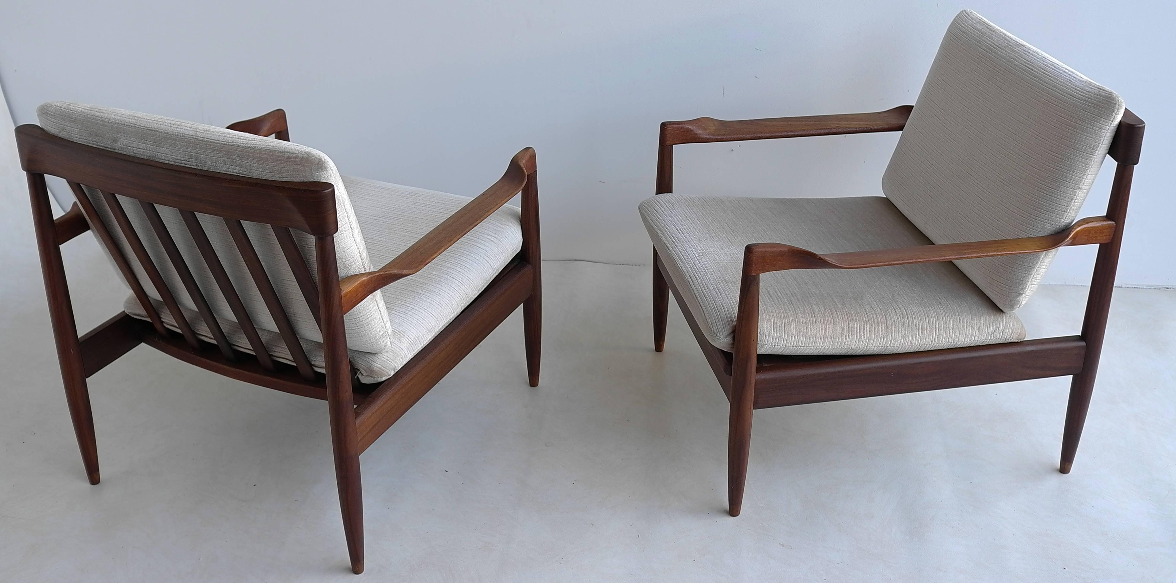 Pair of organic Danish armchairs with crème white velvet upholstery.