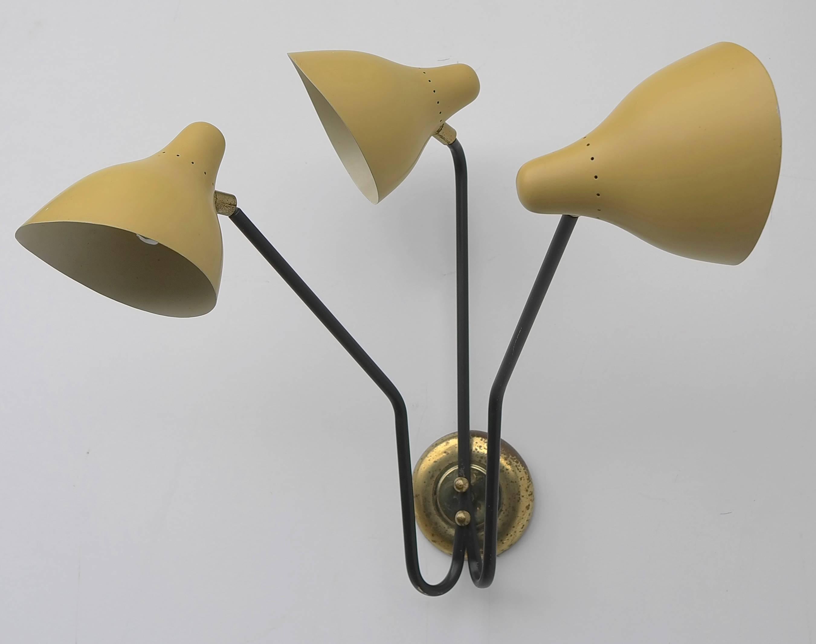 Wall lamp with three yellow adjustable shades, made by Stilux Italy 1950's
