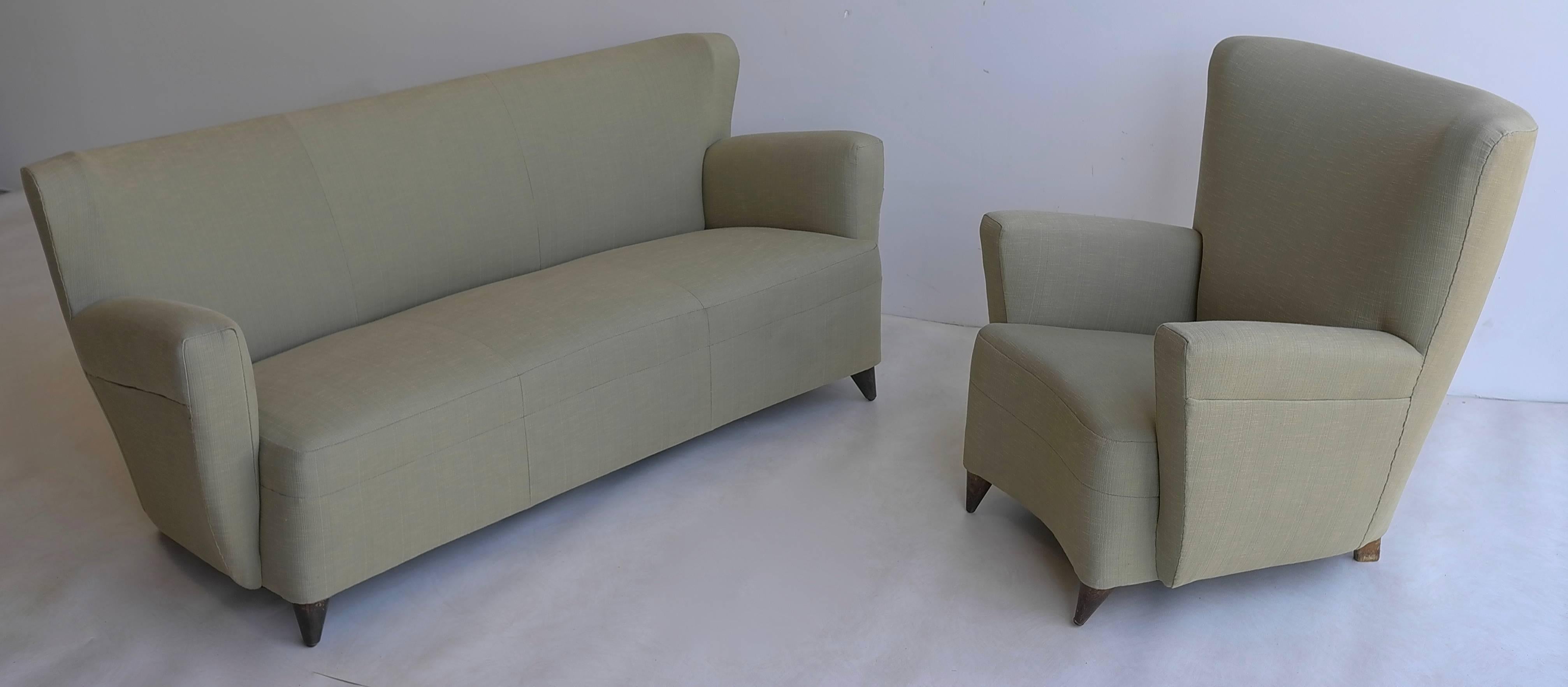 Green Italian sofa and armchair in style of Gio Ponti. Newly upholstered in fine green fabric.