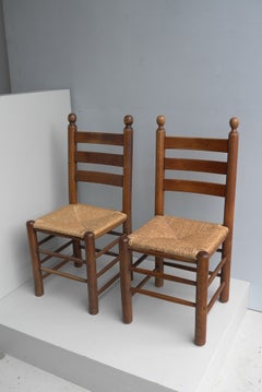 Twelve Oak and Rush Chairs in Style of Charles Dudouyt , France 1960's