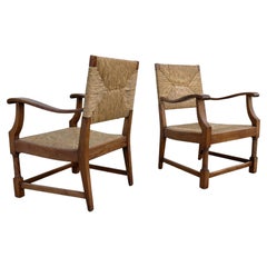 Paire de fauteuils de salon en chêne massif et jonc, Provence française, 1955