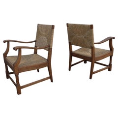 Paire de fauteuils de salon en chêne massif et jonc, Provence française, 1955