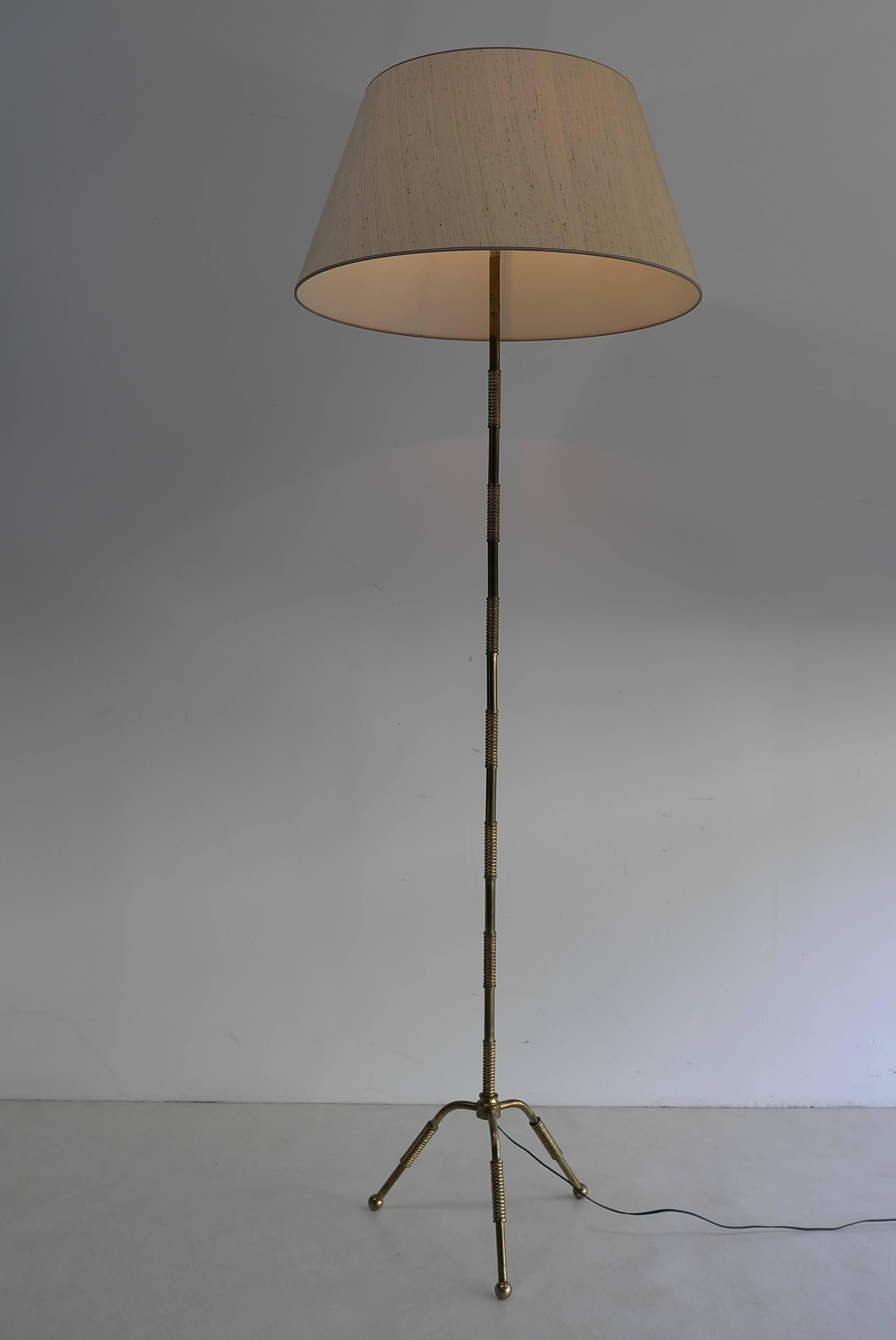 French floor lamp in solid brass by Maison Bagues.
The hood is made from silk.