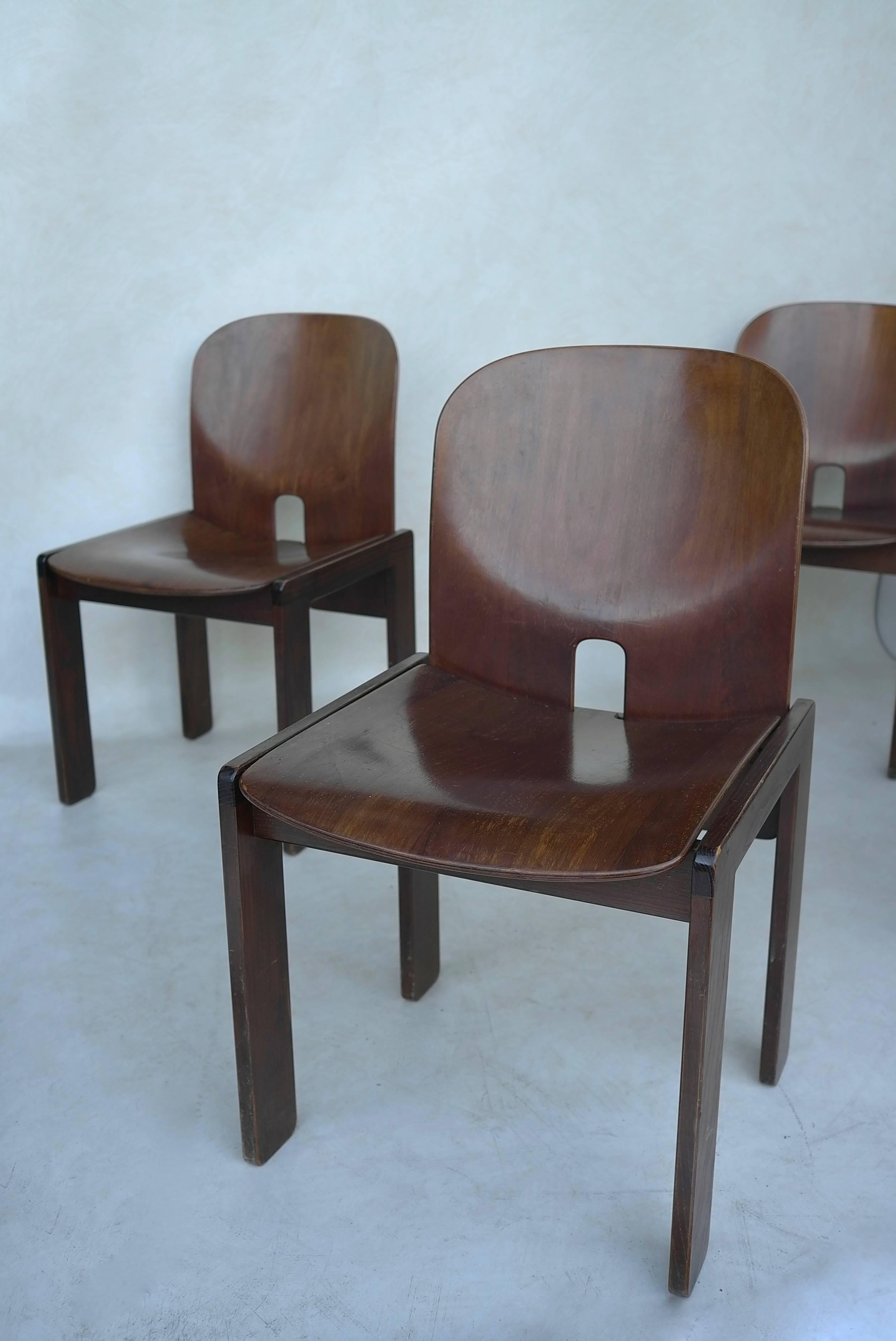 Set of four walnut dining chairs model 121 by Afra & Tobia Scarpa for Cassina, Italy, 1965.