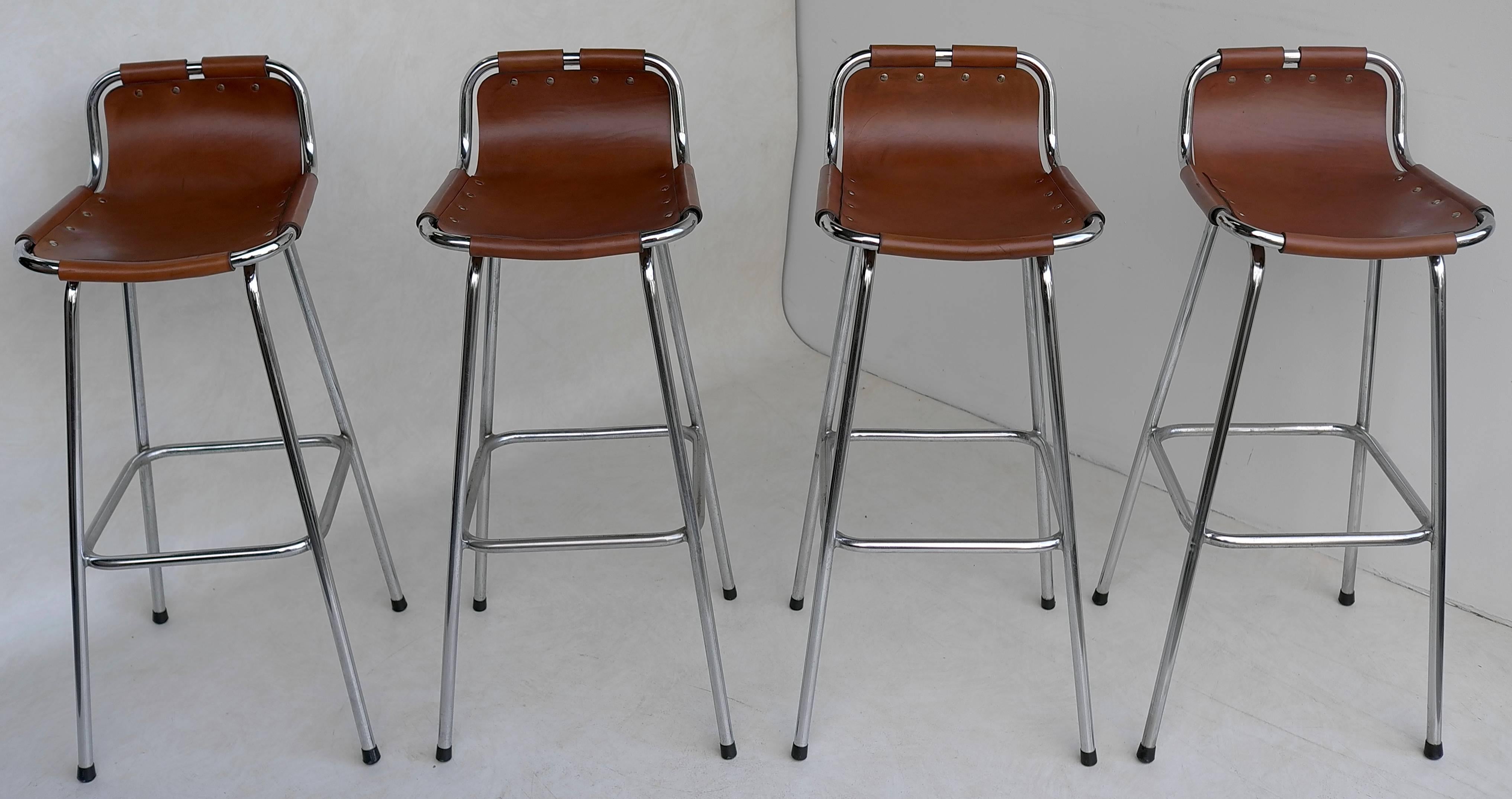 Charlotte Perriand leather barstools for Les Arc Ski Resort, France, 1960s.

Charlotte Perriand was a French architect and designer. Her work aimed to create functional living spaces in the belief that better design helps in creating a better