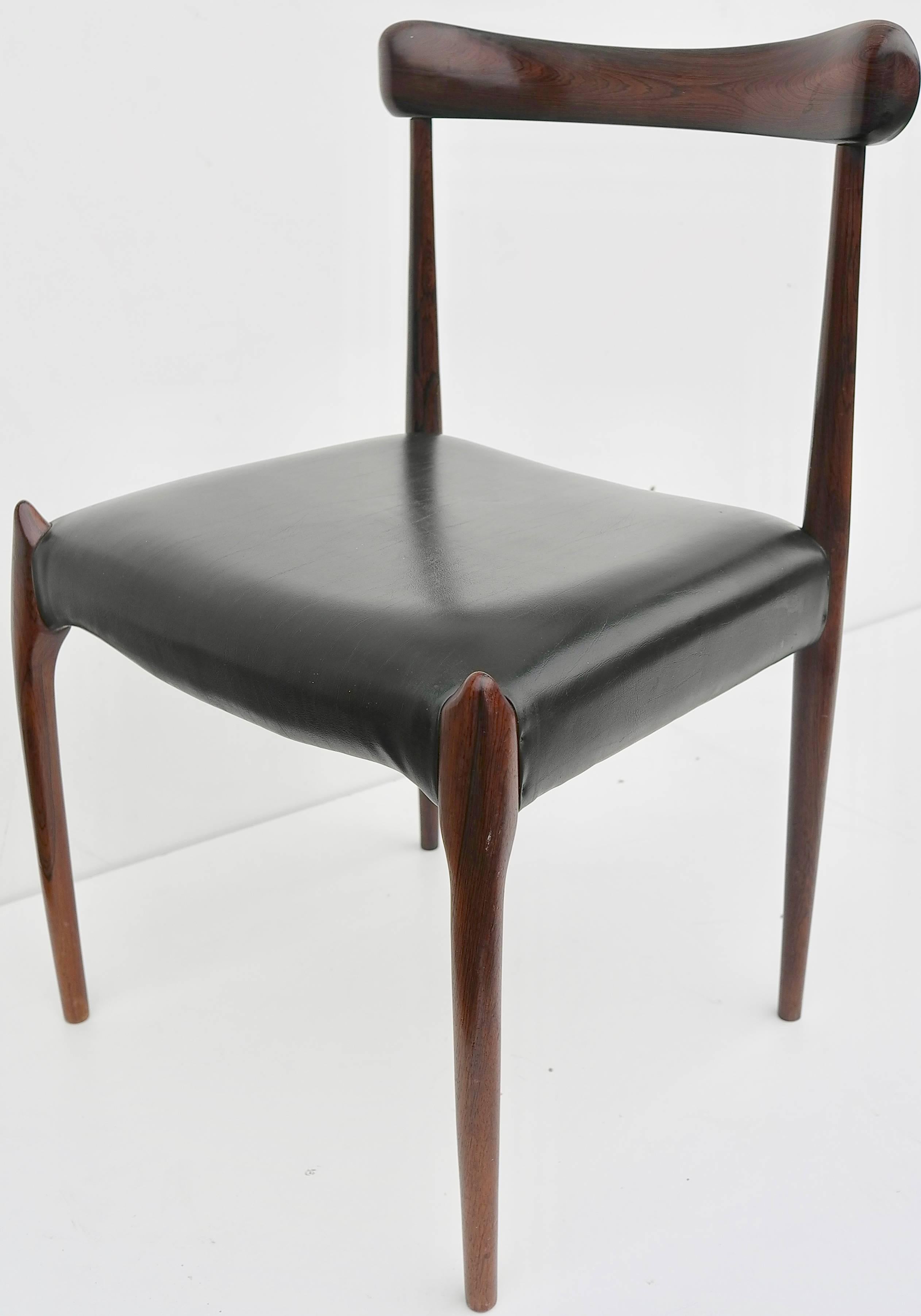 Set of Eight Danish organic dining chairs in solid rosewood.