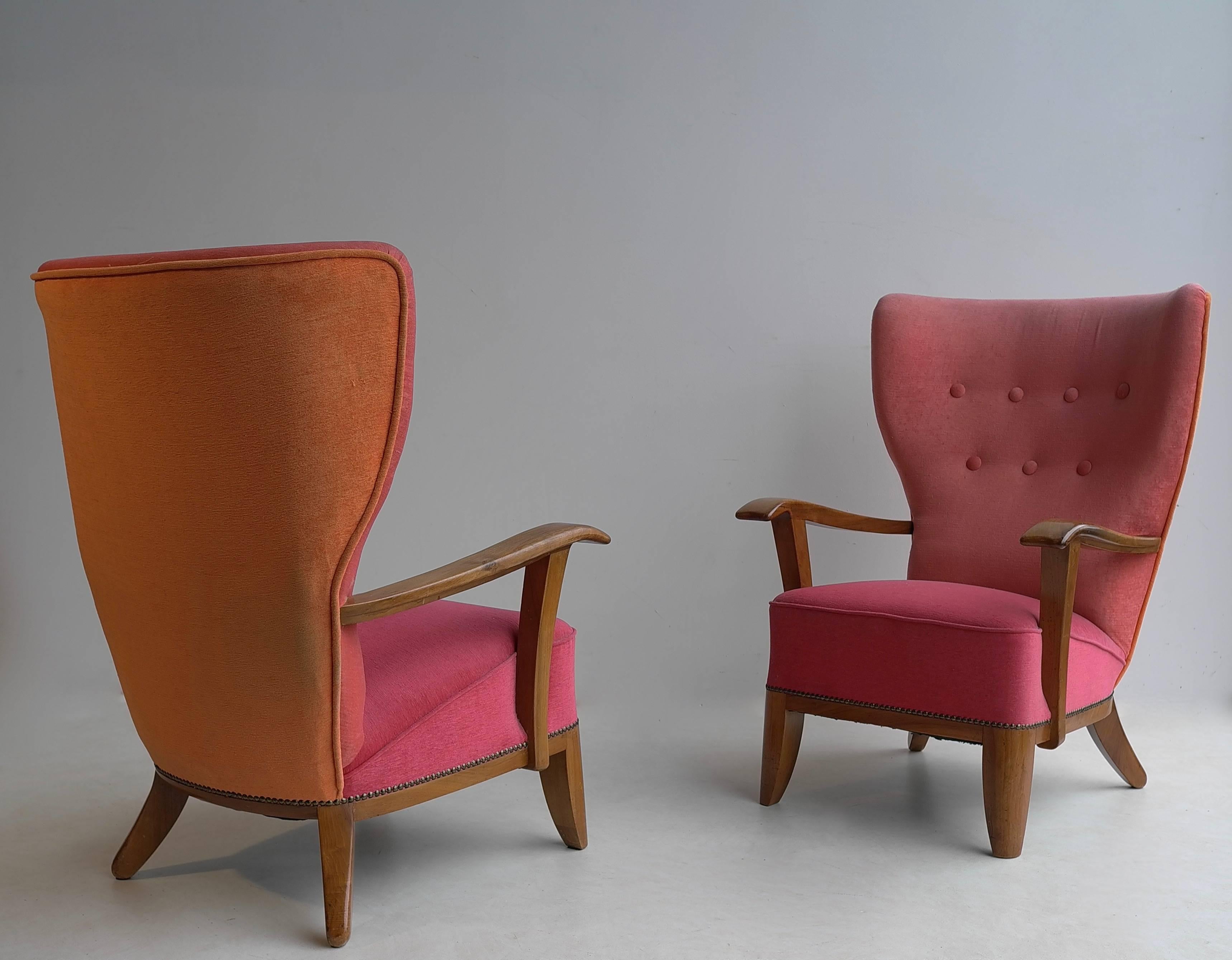 Pair of three-tone Wingback armchairs, France 1940s.
