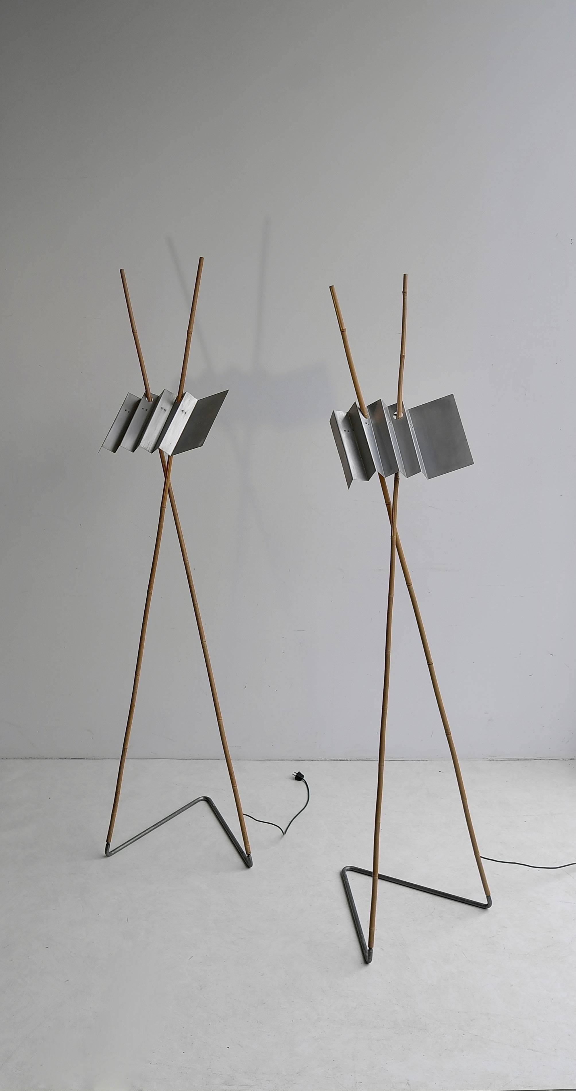 When Anke Kamerman designed this lamp she was inspired by a bamboo fishing-rod that she had found. The aluminium shade is referring to a corrugated iron roof that was on her house when she was living in Tanzania.
Anke Kamerman not only designed