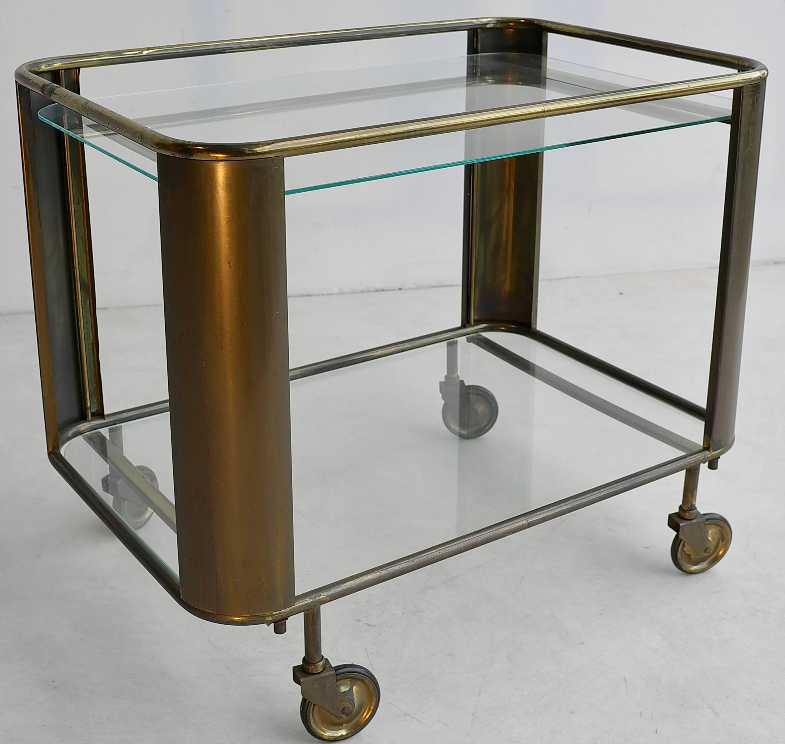 Mid-Century Modern brass and glass bar cart, France, 1950s.