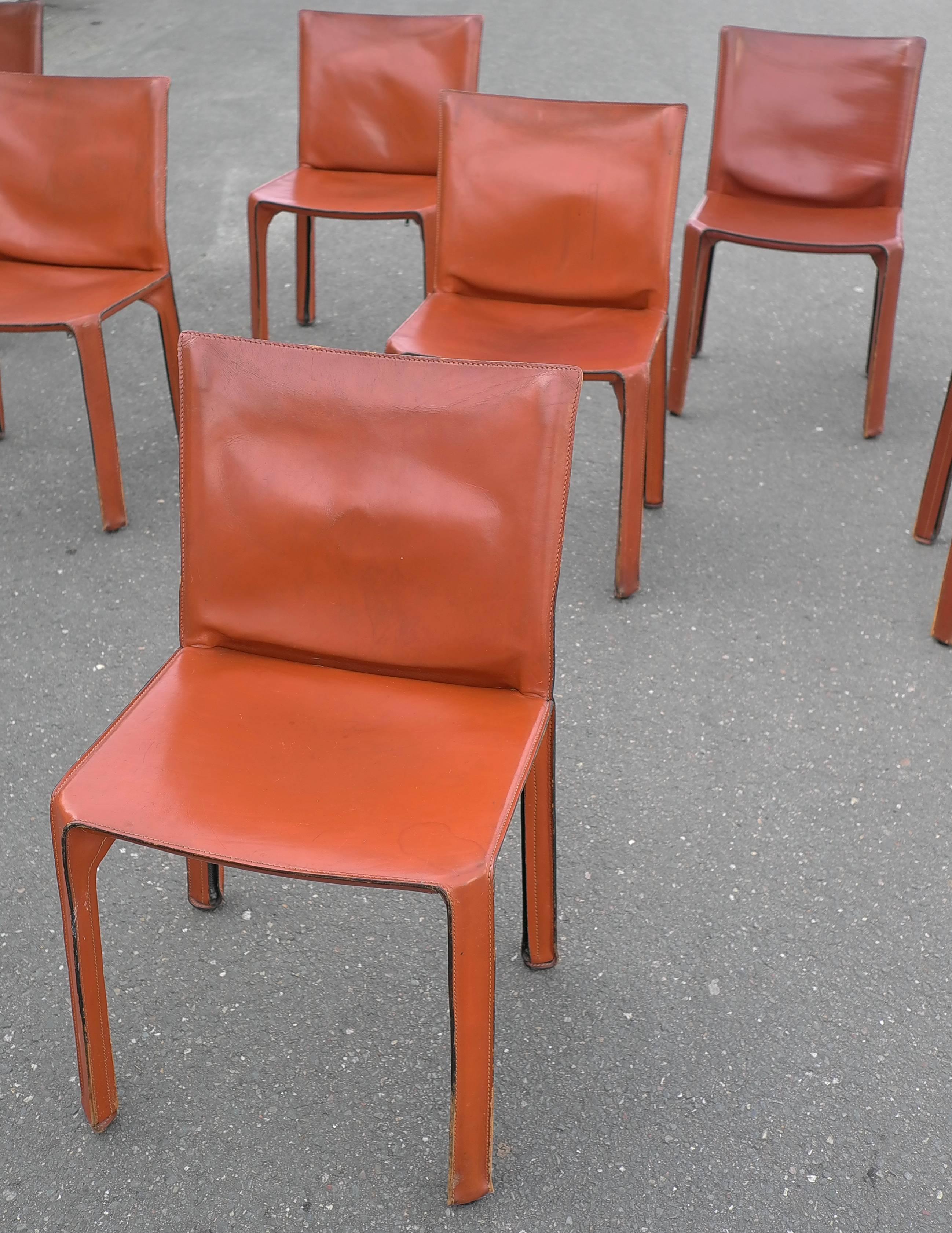 Set of eight cab chairs by Mario Bellini for Cassina, Italy, circa 1970s. 
Wonderful original patina and wear. Broken in like your favorite baseball glove. They have various patina, stains, rubs, scratches and wear. And we wouldn't have it any other