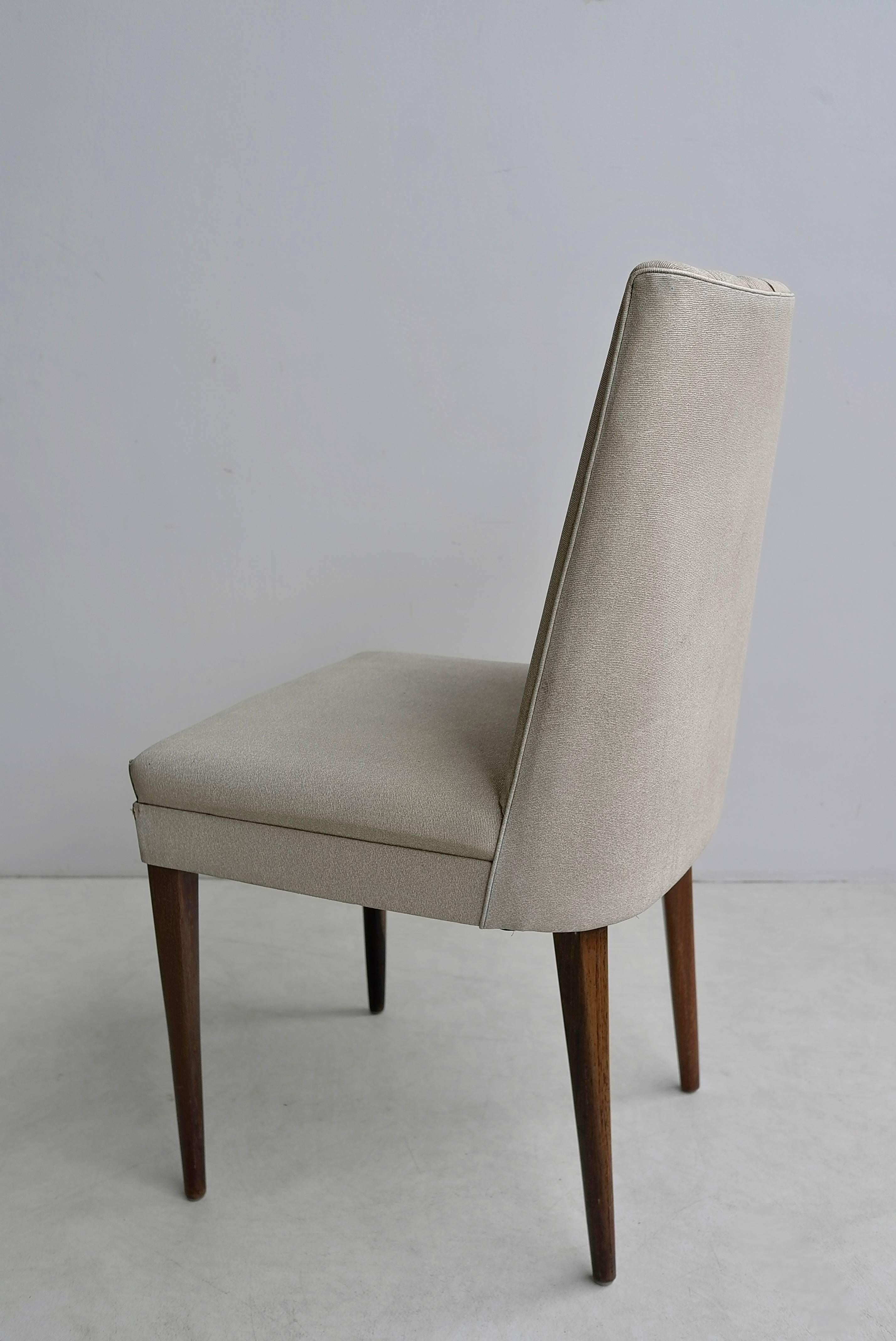 Elegant white desk chair with wooden legs, Italy, 1950s.