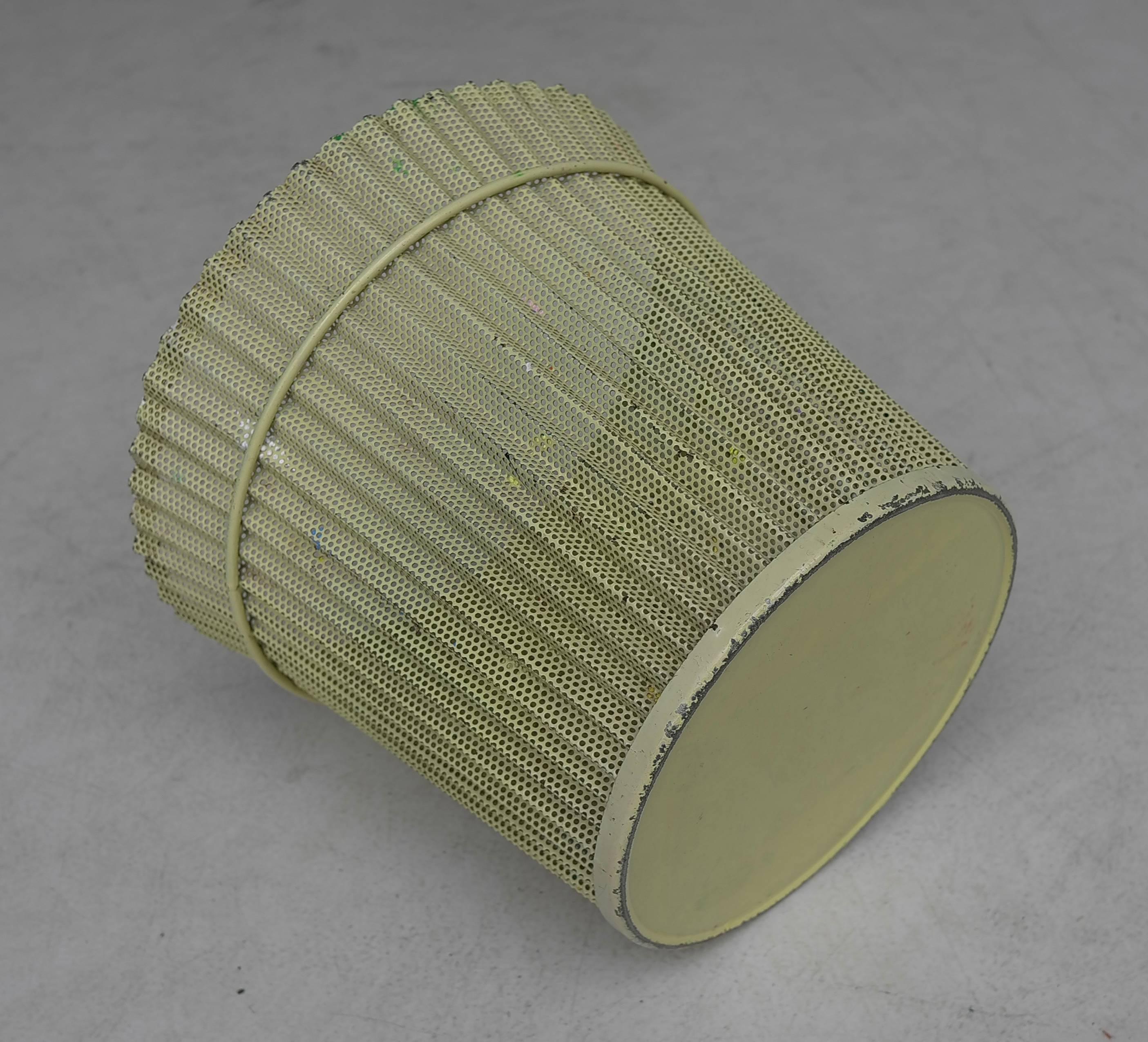 Large Mathieu Matégot wastepaper basket, all original and rare in yellow metal and in this large size.