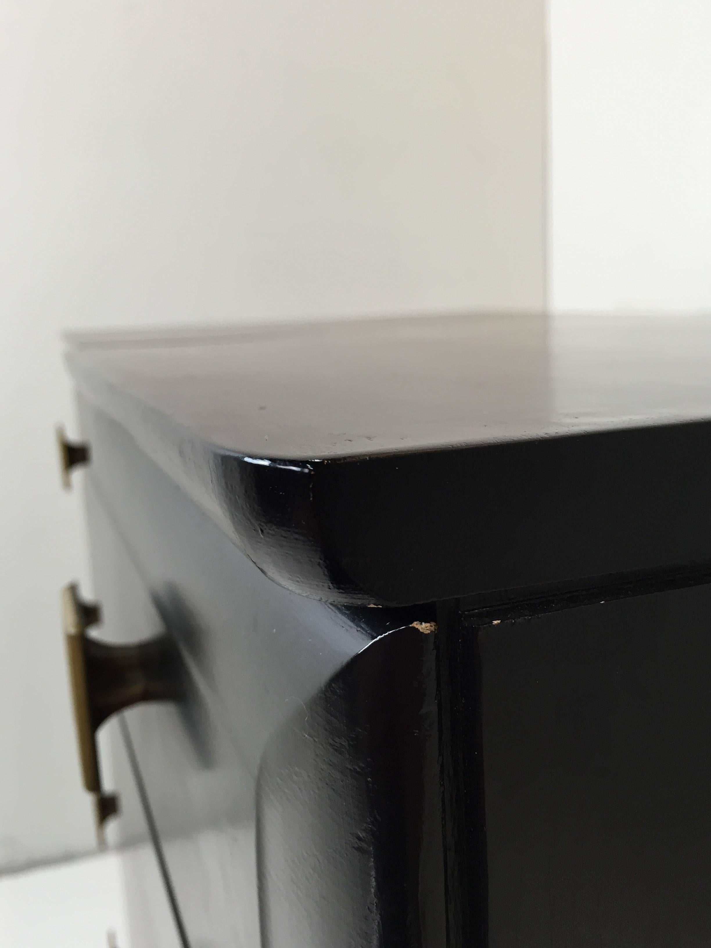 Current finish is ebonized, but our in house restoration team can provide a new lacquer finish or recreate the ebonized finish for you.