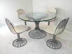 Mid-Century Modernist Dining Set with Sculpted Tubular Base