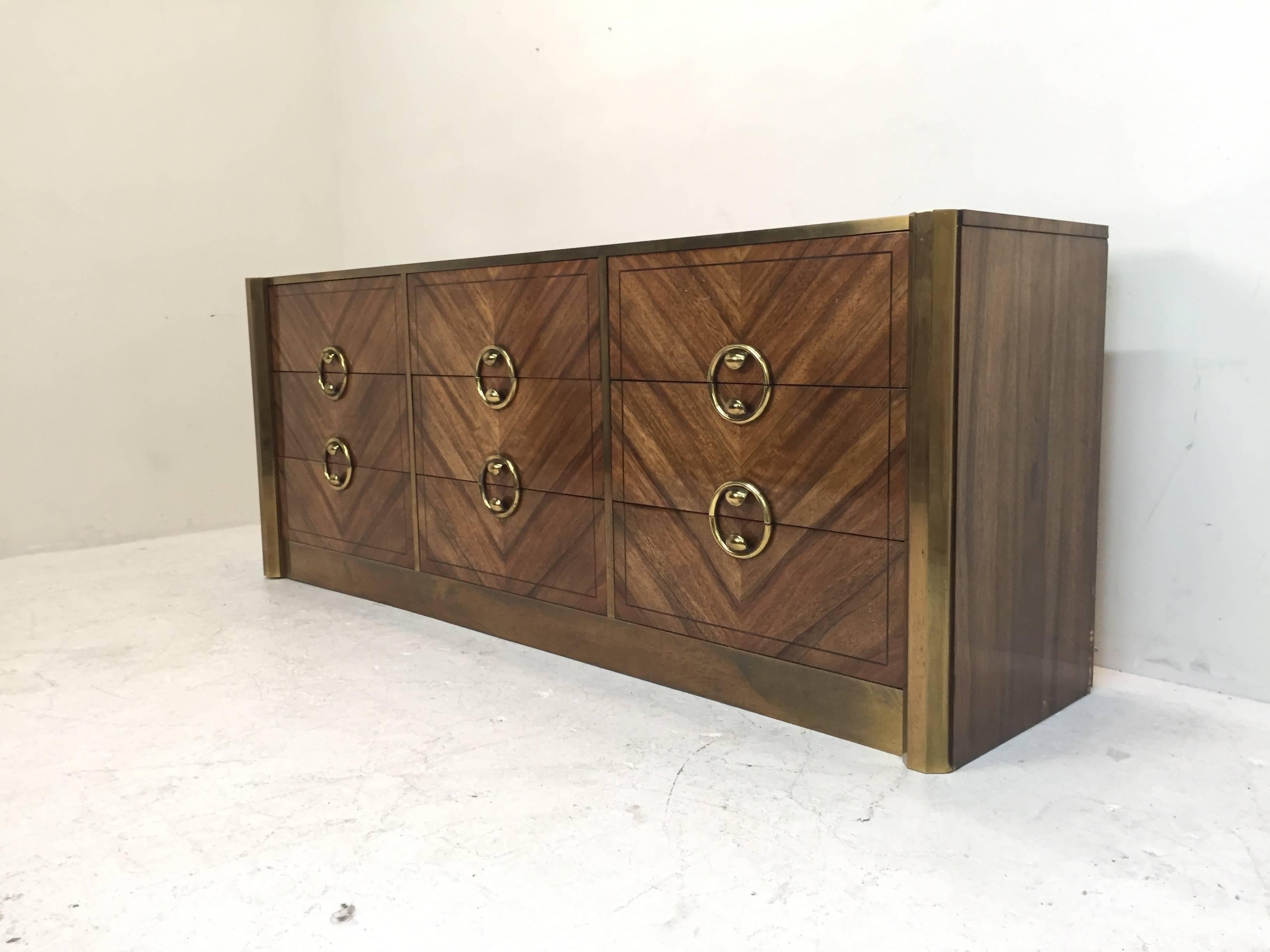 Mastercraft nine-drawer dresser with beautiful zebrano wood.