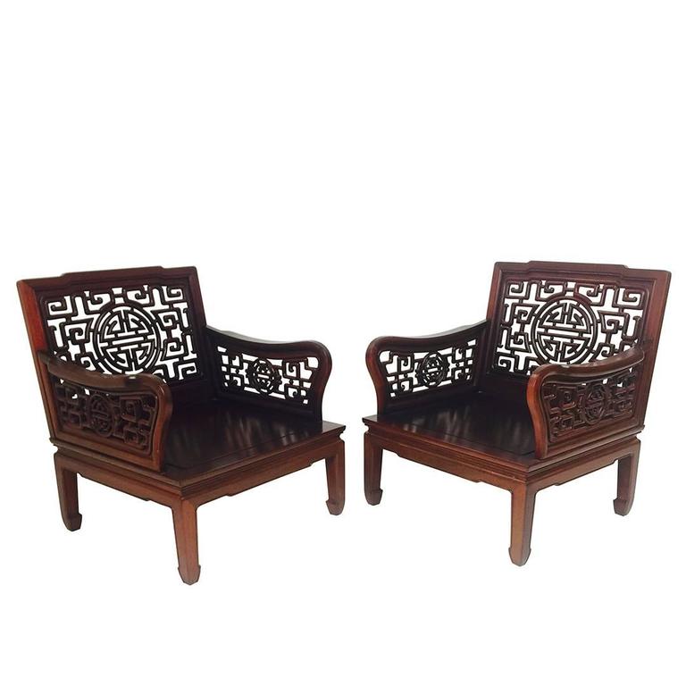 Pair of Carved Chinese Art Deco Cherrywood Lounge Chairs For Sale at