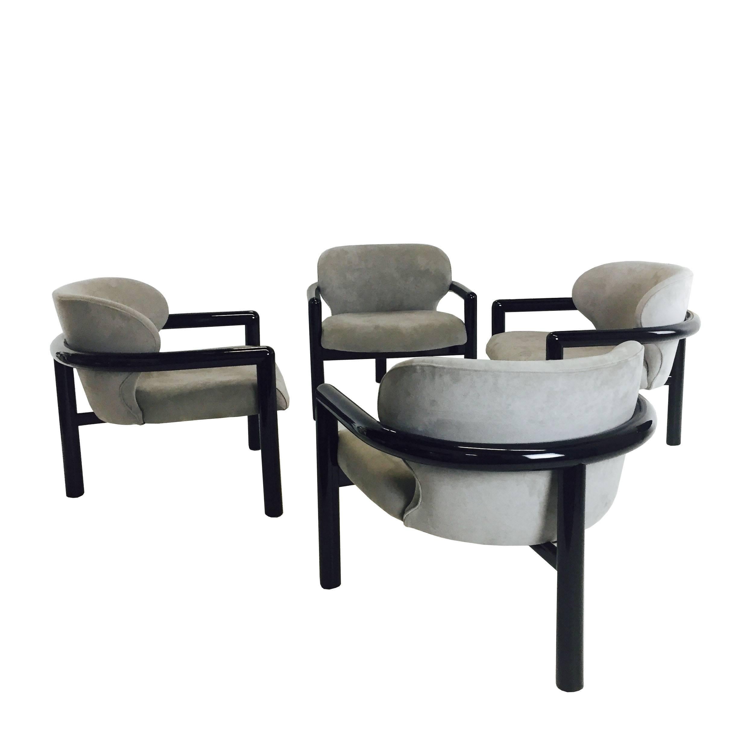 20th Century Pair of Three Legged Lounge Chairs
