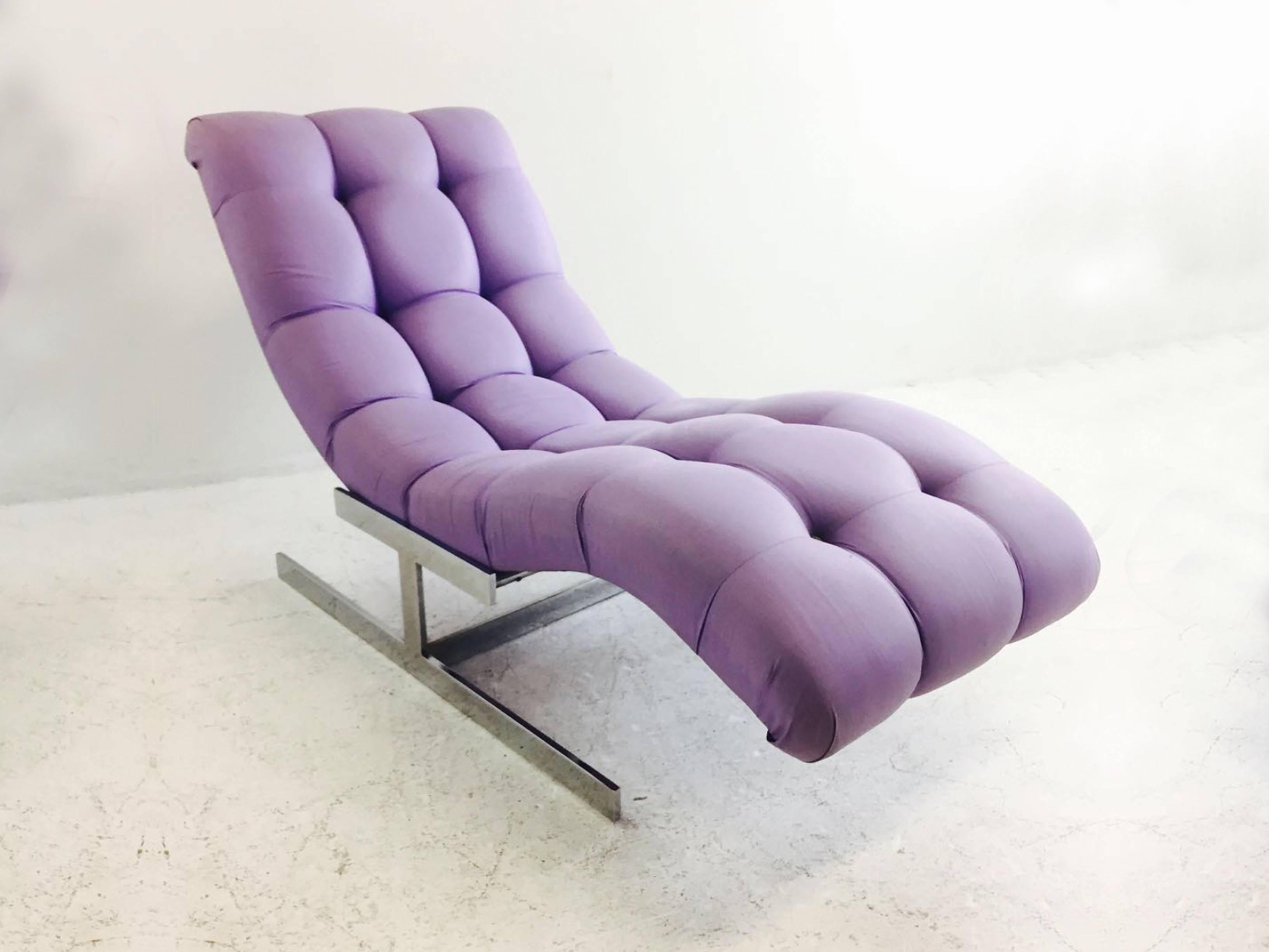 Chrome cantilever base chaise longue in the style Milo Baughman. Lavender upholstery in a biscuit tuft pattern, in good vintage condition, circa 1970s.

Dimensions: 27" W x 58" D x 33" T
Seat height 16".
 