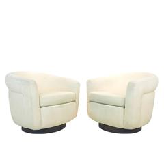Pair of Milo Baughman Side Channel Swivel Chairs with Wood Plinth Base