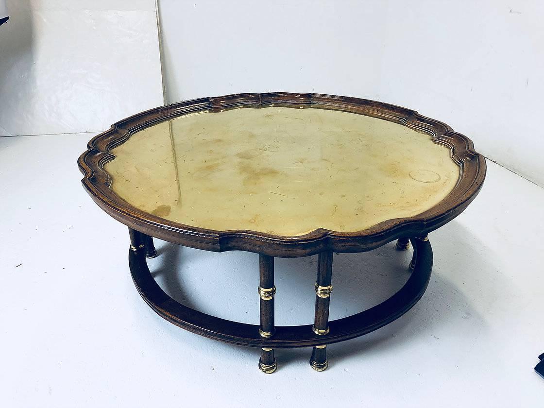 20th Century Wood and Brass Accented Pie Crust Coffee Table with Gold Mirrored Glass