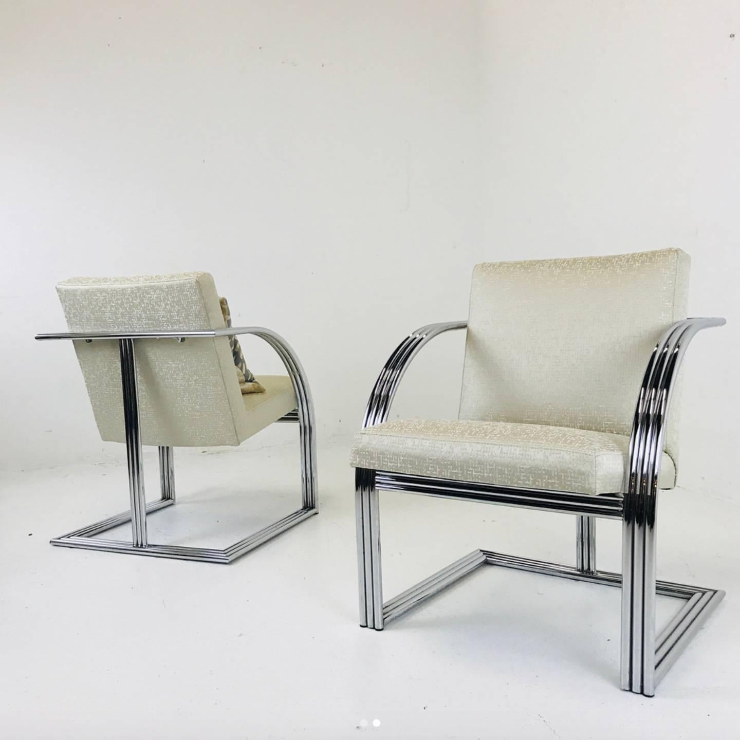 Pair of Milo Baughman T-Back Deco style armchairs. Newly upholstered in a gorgeous textured fabric. The chrome finish is in good vintage condition with some areas needing polishing. (see photos)

Dimensions: 
25