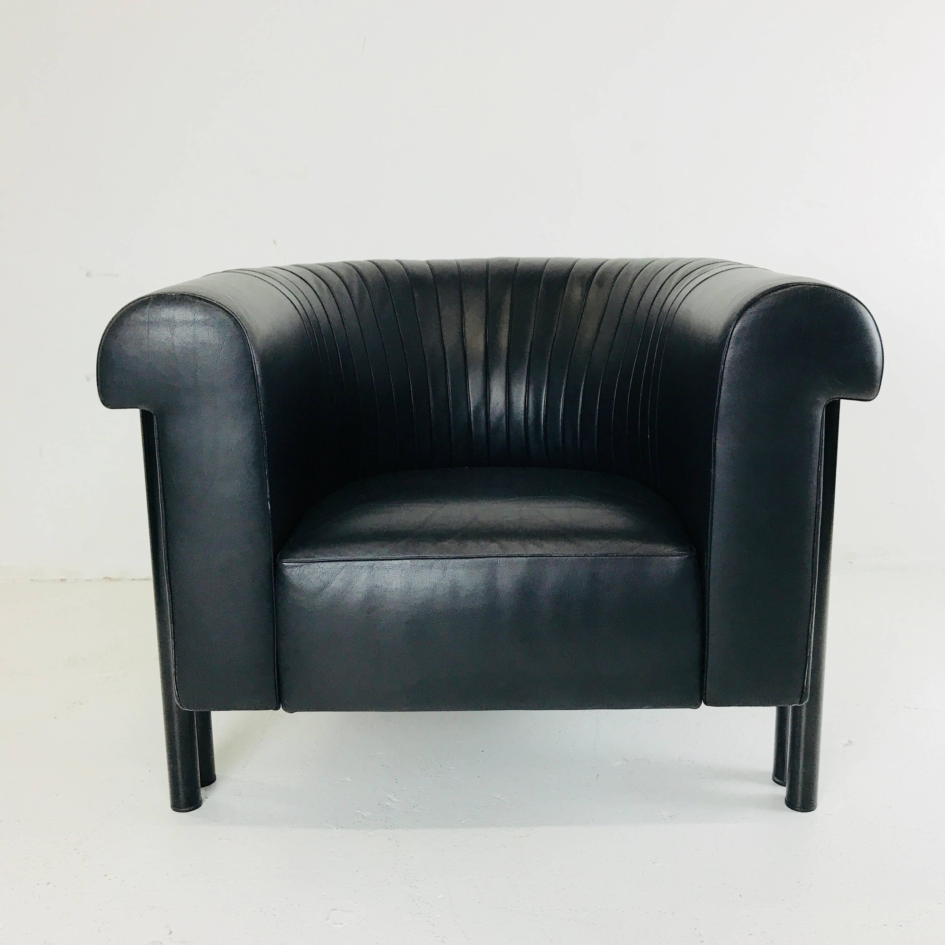 Swiss Pair of Black Leather Lounge Armchairs by De Sede