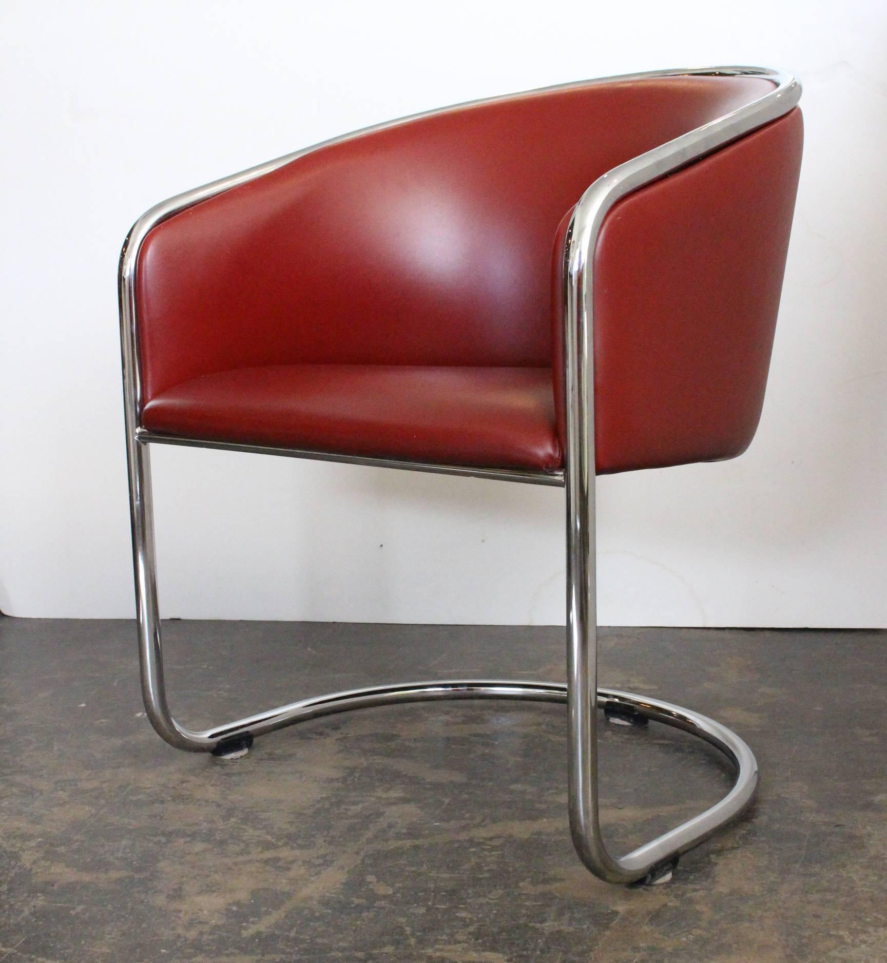 Set of 8 Cantilever Thonet Dining Chairs. Upholstered in a red vinyl. 

dimensions: 24.5