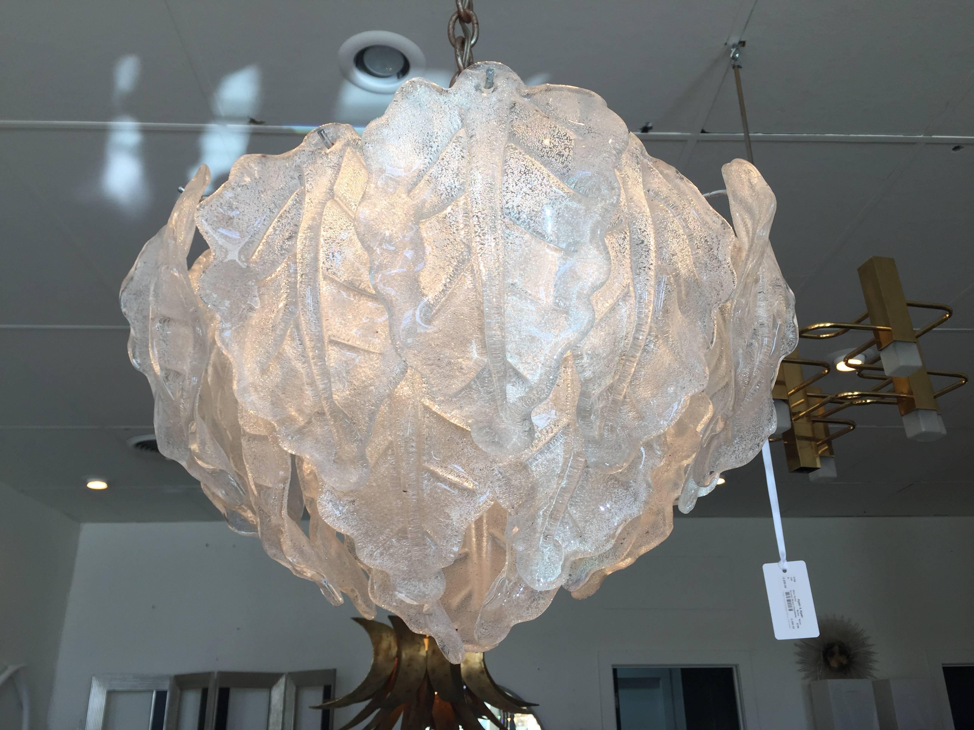 Murano leaf chandelier. The glass is smooth on the front and textured on back with five lights.

Dimensions: 20