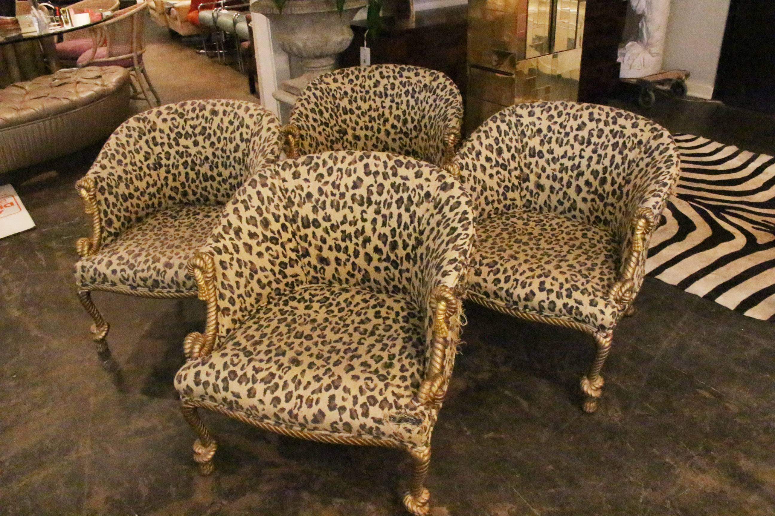 Pair of gilded leopard print Rope & Tassel chairs. These chairs would be so fabulous in hot pink velvet and new gold finish. The upholstery does need to be replaced. (Two pairs available).

Dimensions: 26