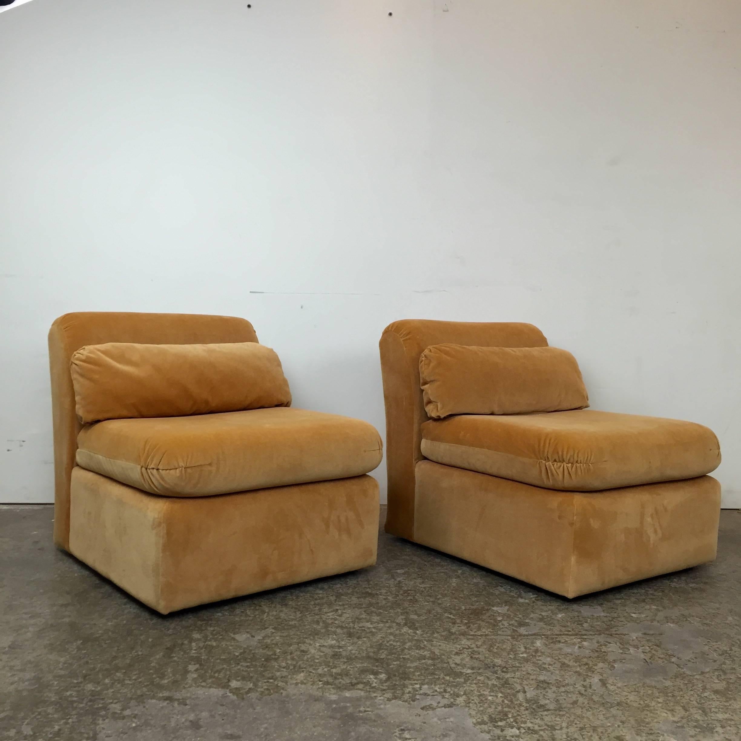 Pair of 1970s cube slipper chairs designed by 1960s famed Texas interior designer Howard Goldman. These fun chairs can be used together or separated.

Dimensions: 25
