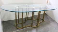 Ovaler Esstisch aus Glas und Messing von Mastercraft