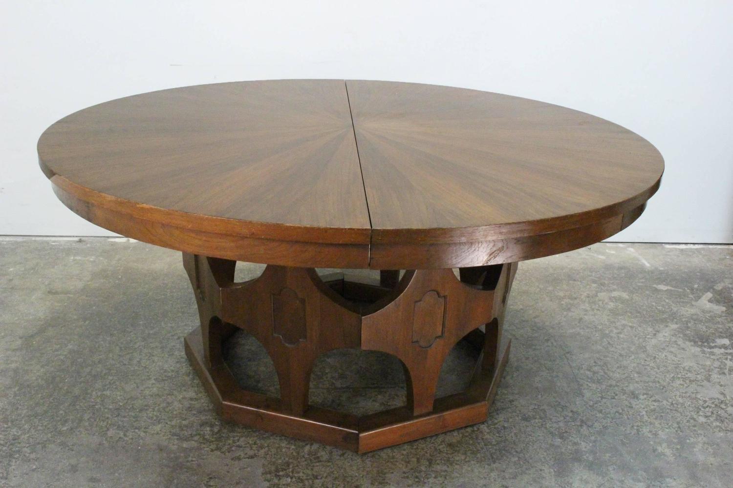 1960s Mid-Century Expandable Round Walnut Dining Table at 1stdibs